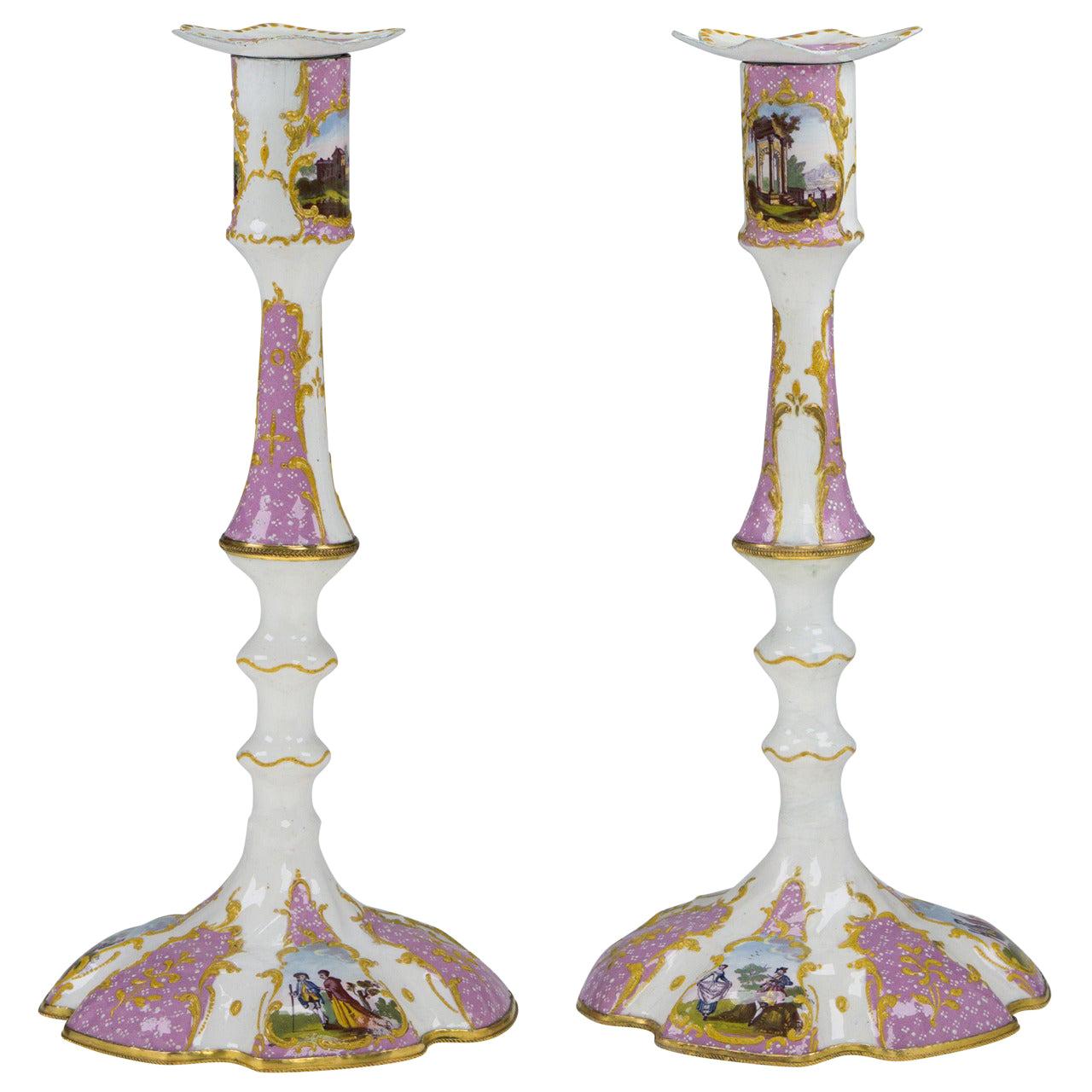 Pair of English Enamel Candlesticks with Rococo Scenes on Pink Ground, 1780 For Sale
