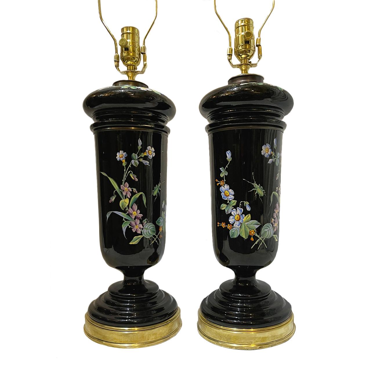Pair of circa 1920's English porcelain floral lamps with gilt bases.

Measurements:
Height of body: 17.5