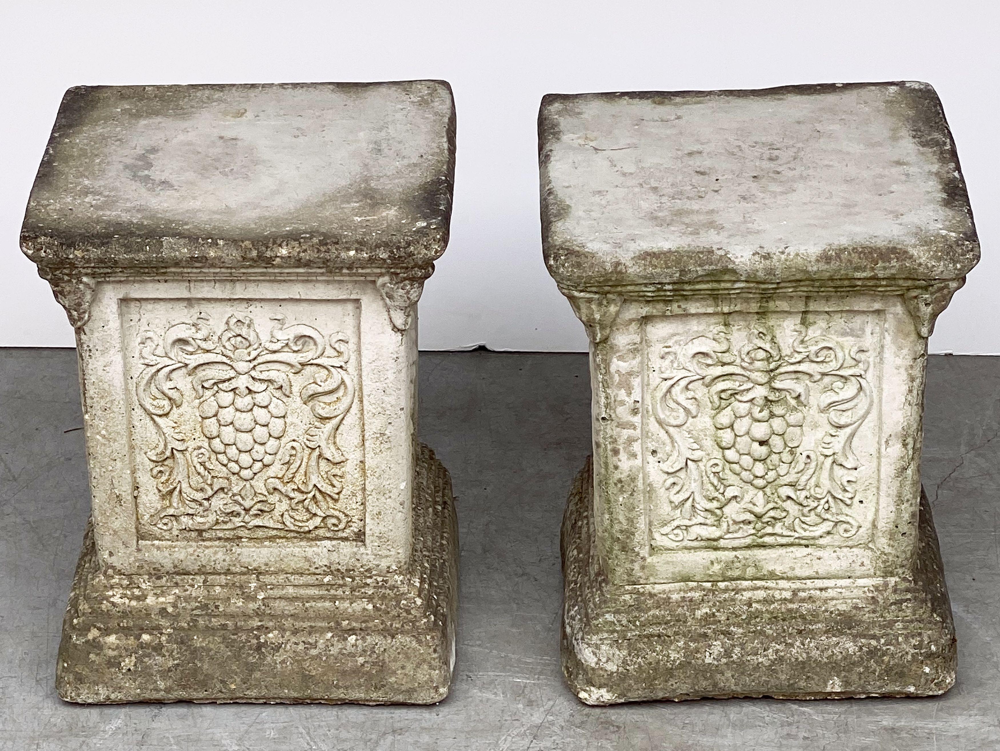 Cast Pair of English Garden Stone Pedestals or Plinths with Grape Motif For Sale