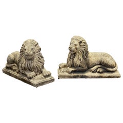 Pair of English Garden Stone Recumbent Lions, Sold as a Pair