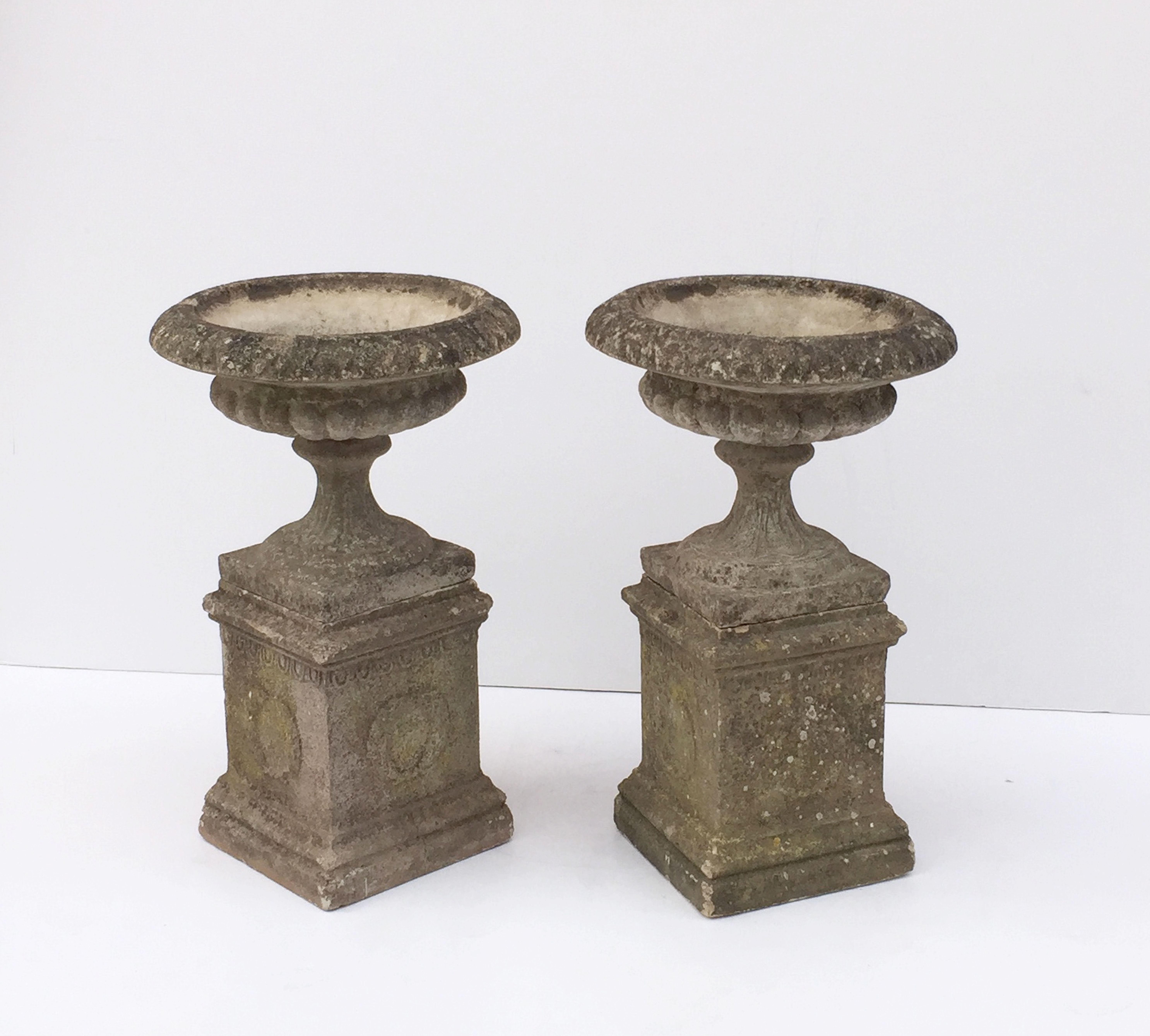 20th Century Pair of English Garden Stone Urns on Plinths with Garlands 'Individually Priced'