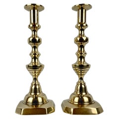 A Pair of 12" Diamond and Beehive Push-Up Brass Candlesticks, England, 19th c.