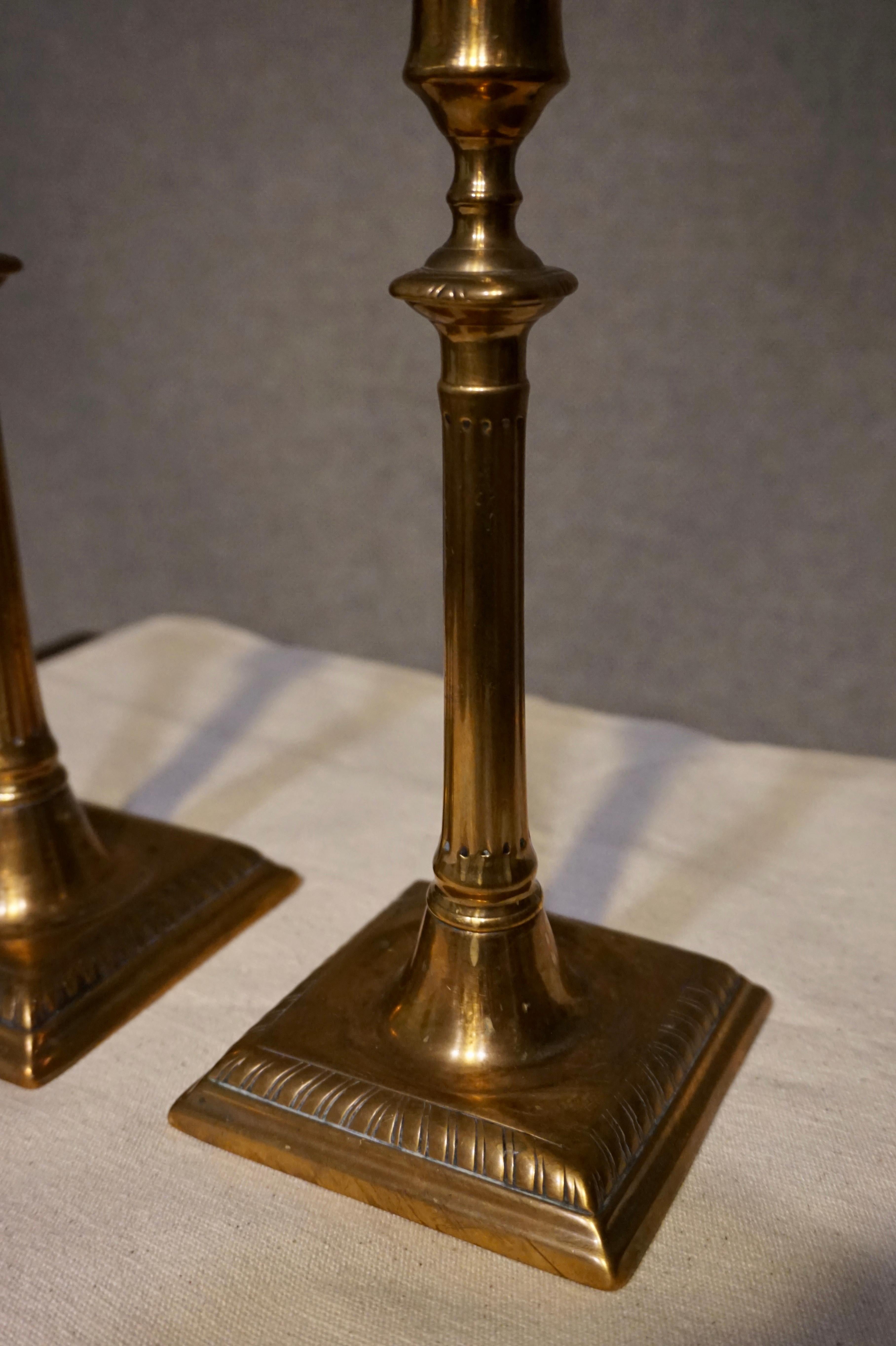 Rare old Georgian brass candlesticks with true patina exuding old world charm,

circa 1790-1800.