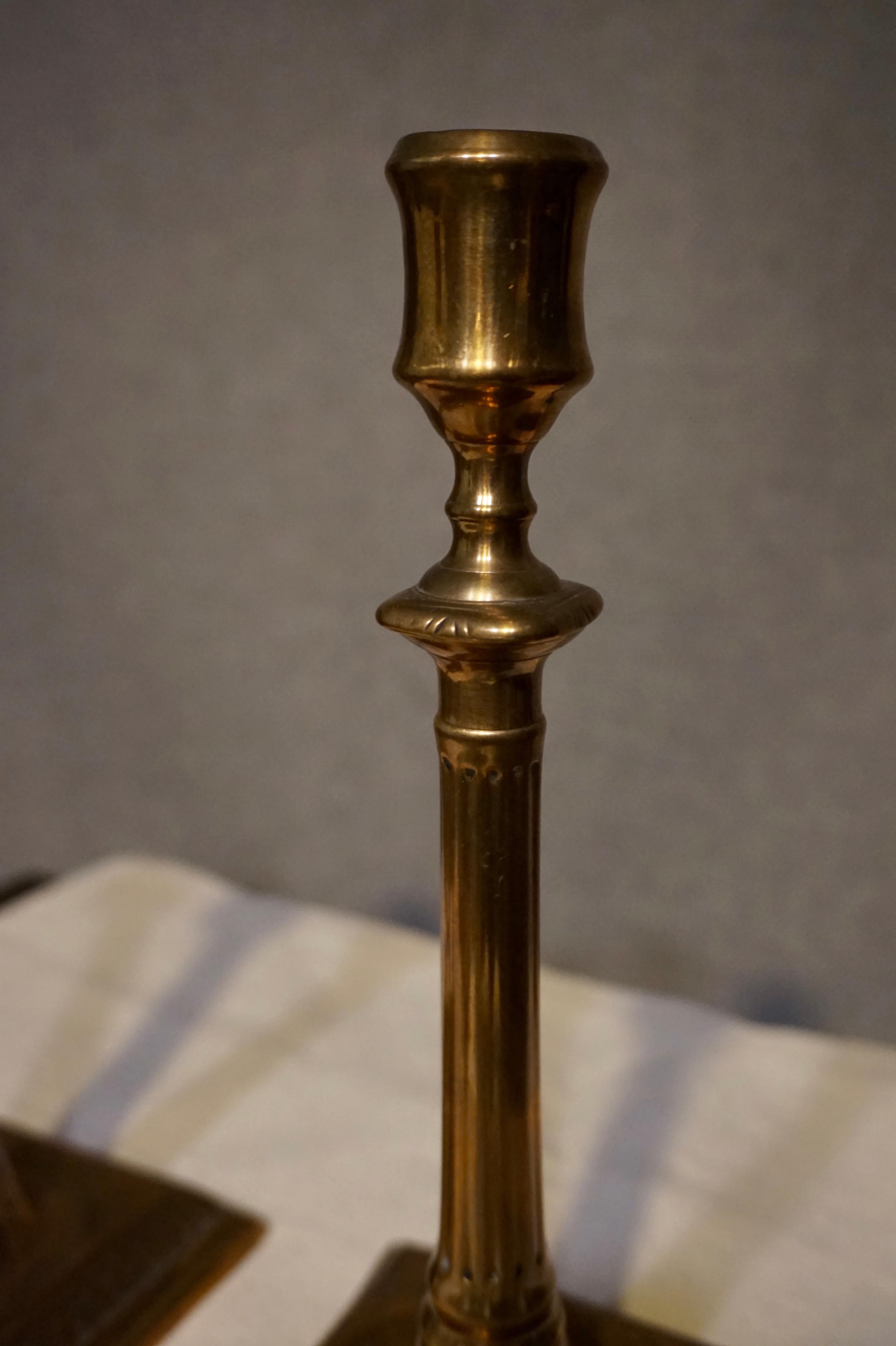 Cast Pair of English Georgian Brass Candlesticks
