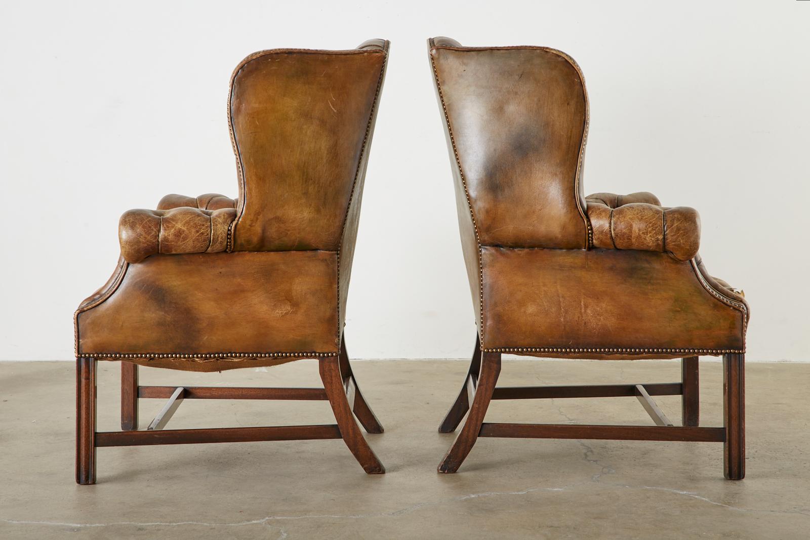 Pair of English Georgian Cigar Leather Wingback Library Chairs In Distressed Condition In Rio Vista, CA