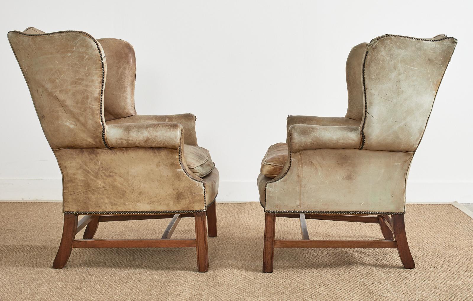19th Century Pair of English Georgian Cigar Leather Wingback Library Chairs For Sale