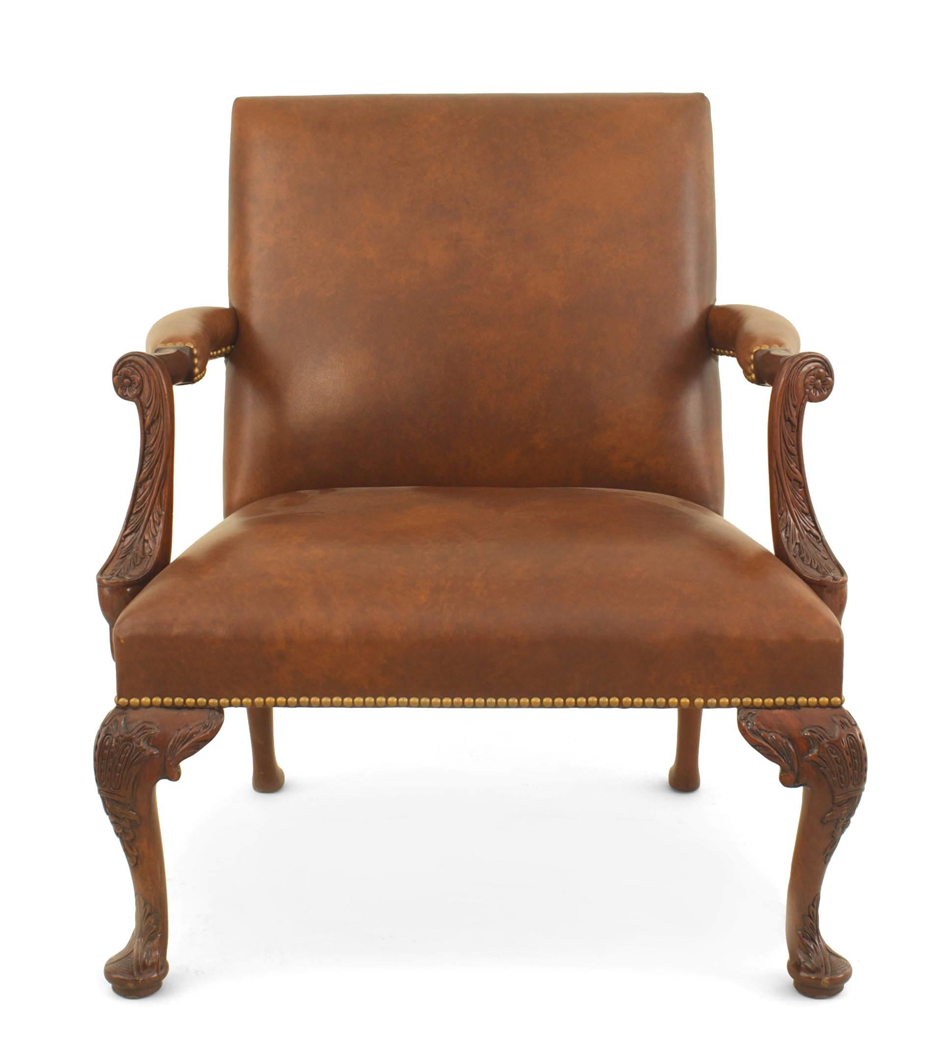 Pair of English Georgian Queen Anne style modern carved open Armchair with a square back and upholstered in brown leather.
