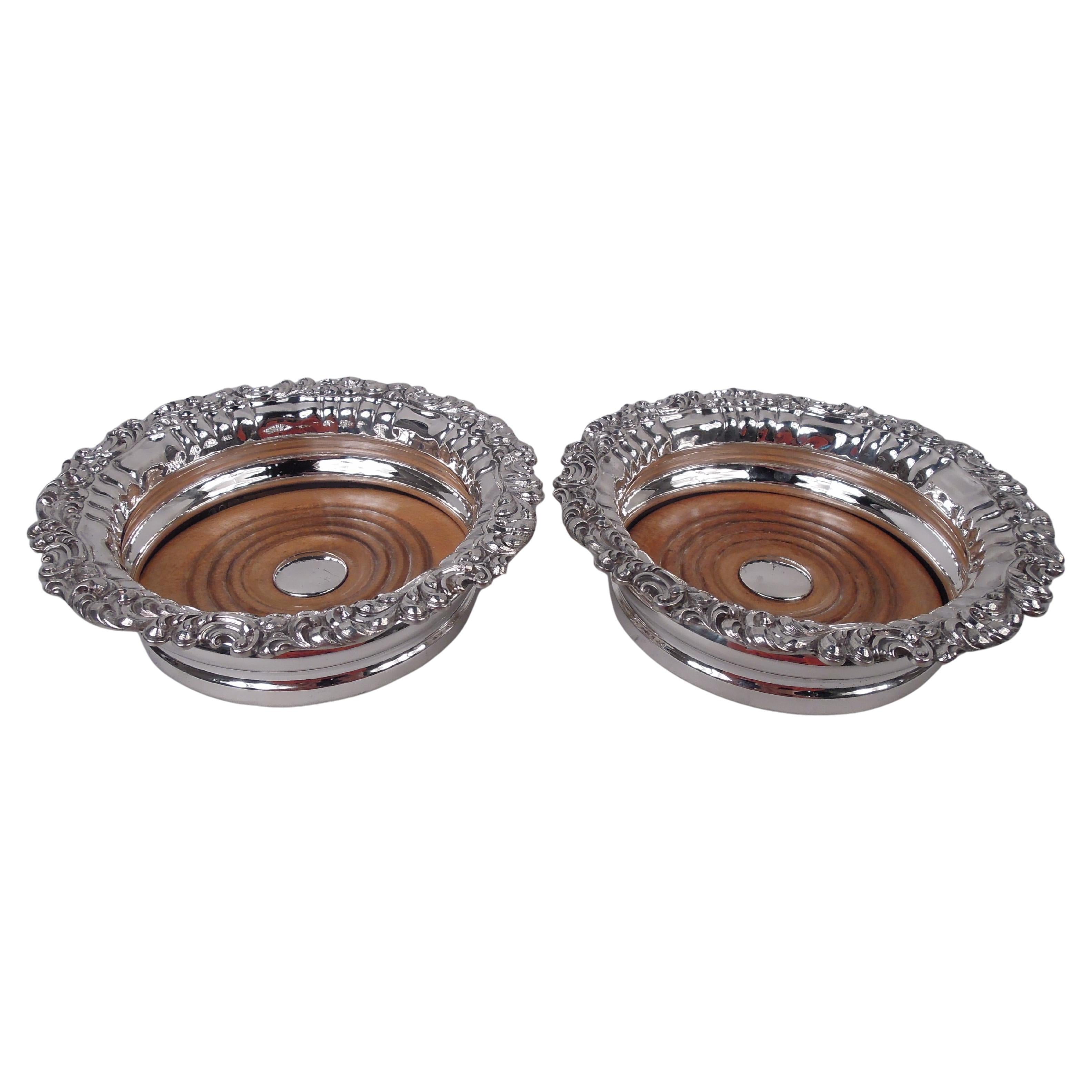 Pair of English Georgian Regency Sterling Silver Wine Coasters, 1828 For Sale