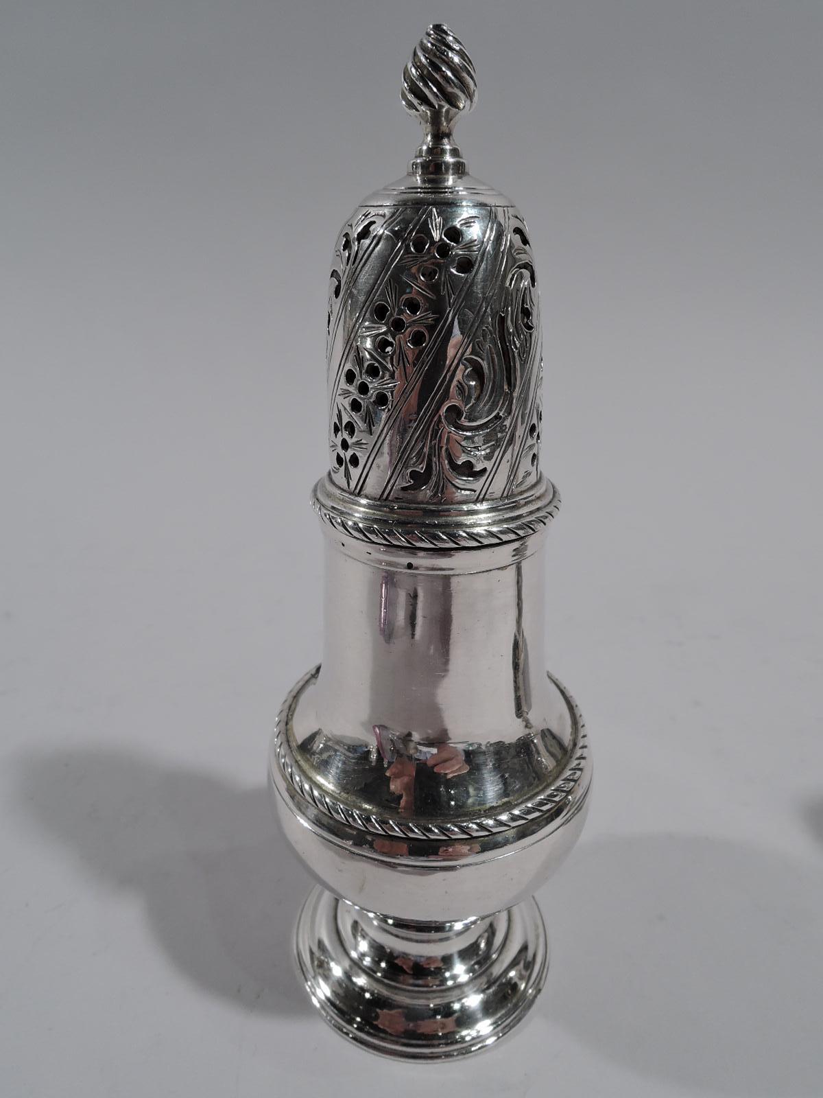 Pair of George III sterling silver condiment casters. Made by Robert Palmer in London in 1767. Baluster on raised foot. Cover has ornamental piercing and finial. Cabled borders. Fully marked. Total weight: 7 troy ounces.