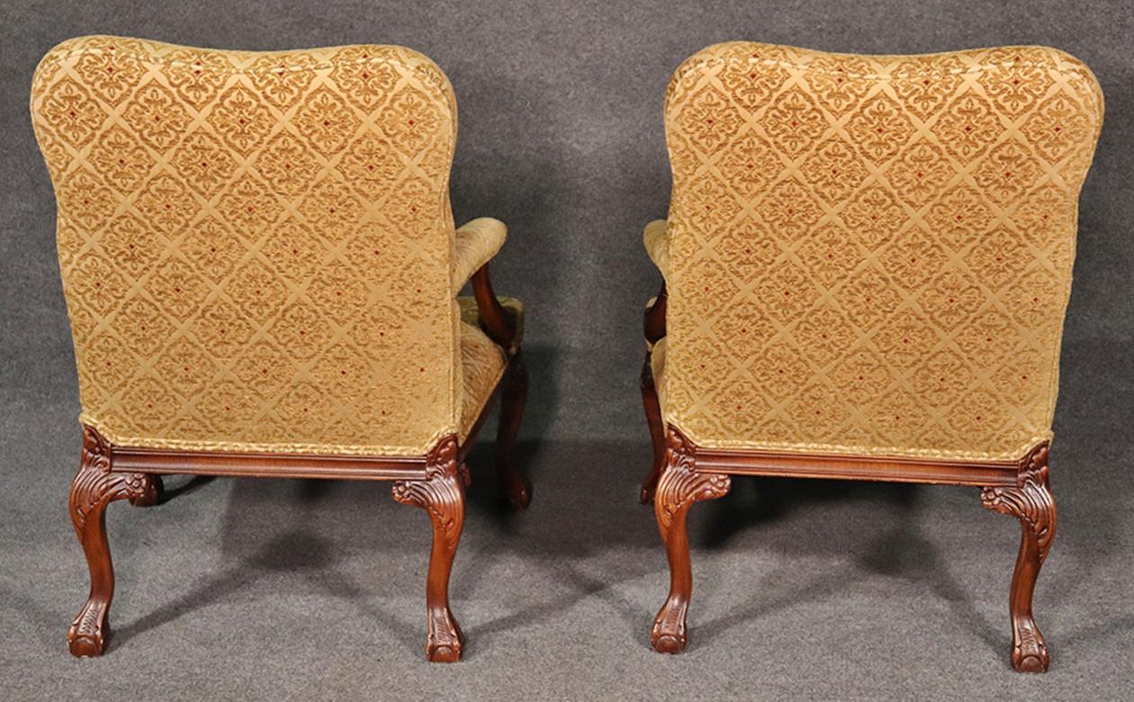 20th Century Pair of English Georgian Style Carved Walnut Lounge Chairs