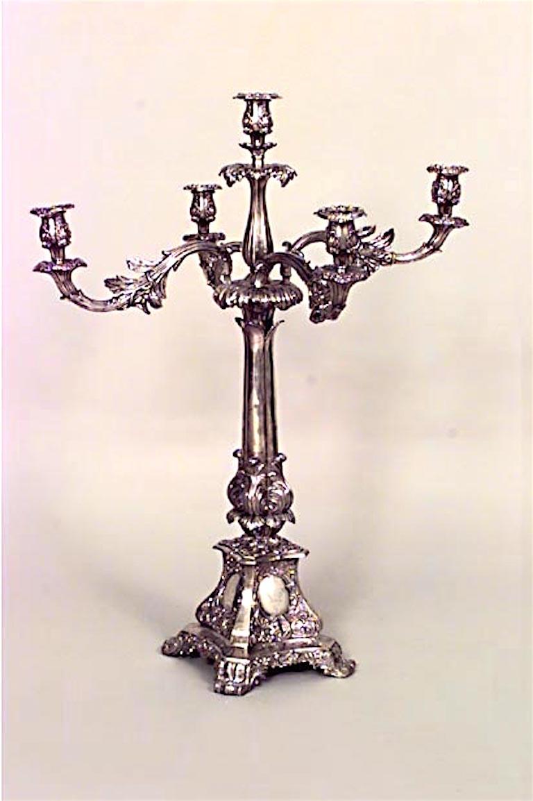 Pair of English Georgian-style (19th Century) silver plate 5 arm candelabras with armorial design on bases. (PRICED AS Pair)
