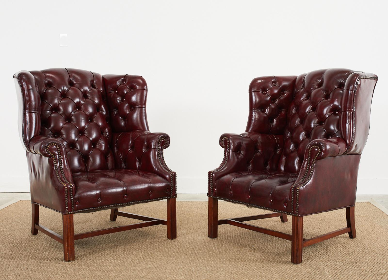 Brass Pair of English Georgian Style Tufted Cordovan Leather Wingbacks