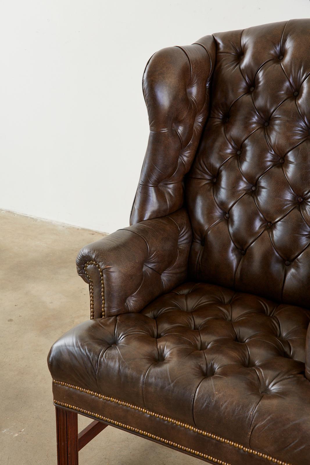 Pair of English Georgian Style Tufted Leather Wingbacks with Ottoman 5