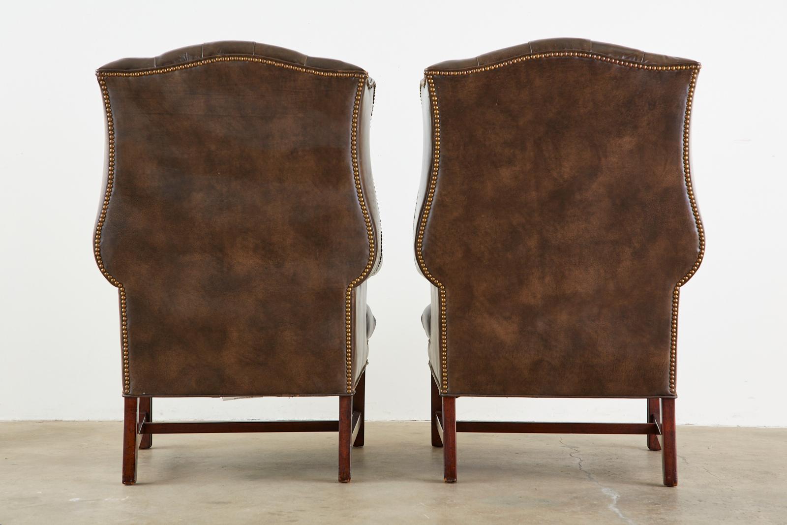 Pair of English Georgian Style Tufted Leather Wingbacks with Ottoman 11
