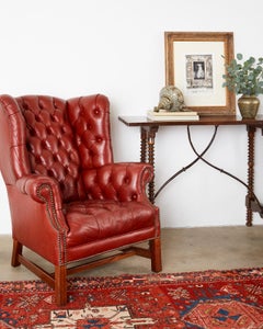Pair of English Georgian Tufted Red Leather Wingback Chairs