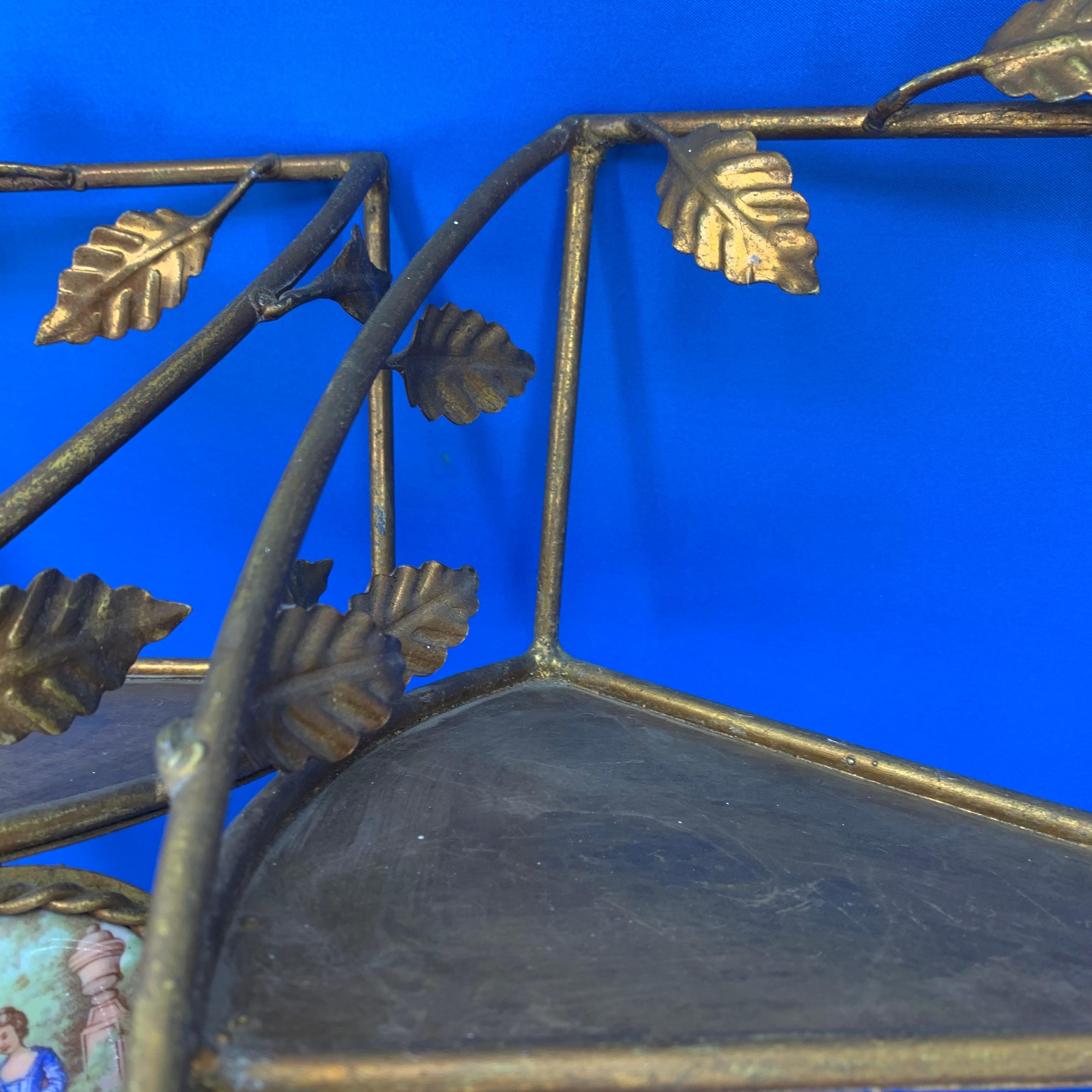 Gilt Pair Of Gilded Metal Spiral Staircase Wall-Mounted Shelves