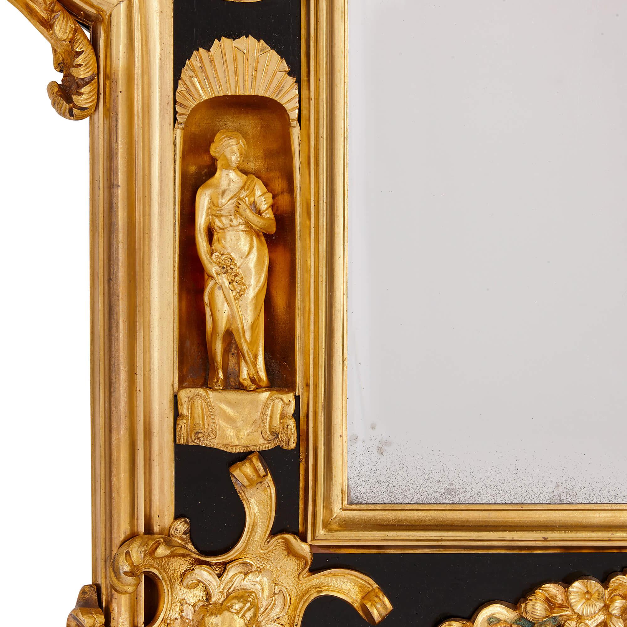 Moulage Paire de miroirs anglais en bronze doré et bois ébénisé en vente