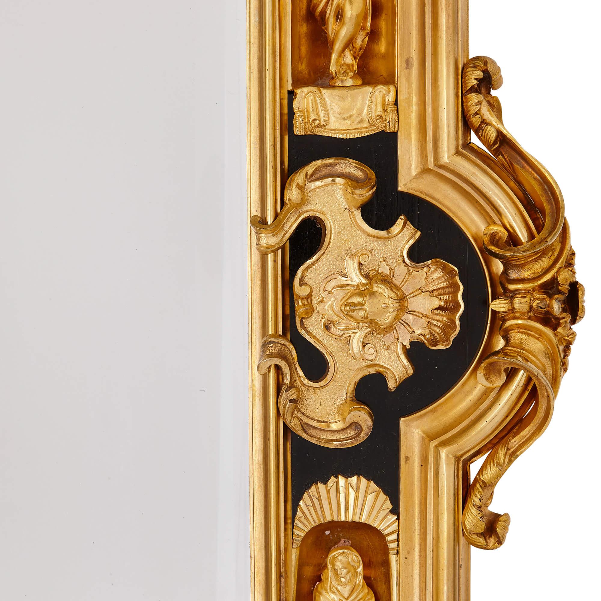 Bronze doré Paire de miroirs anglais en bronze doré et bois ébénisé en vente