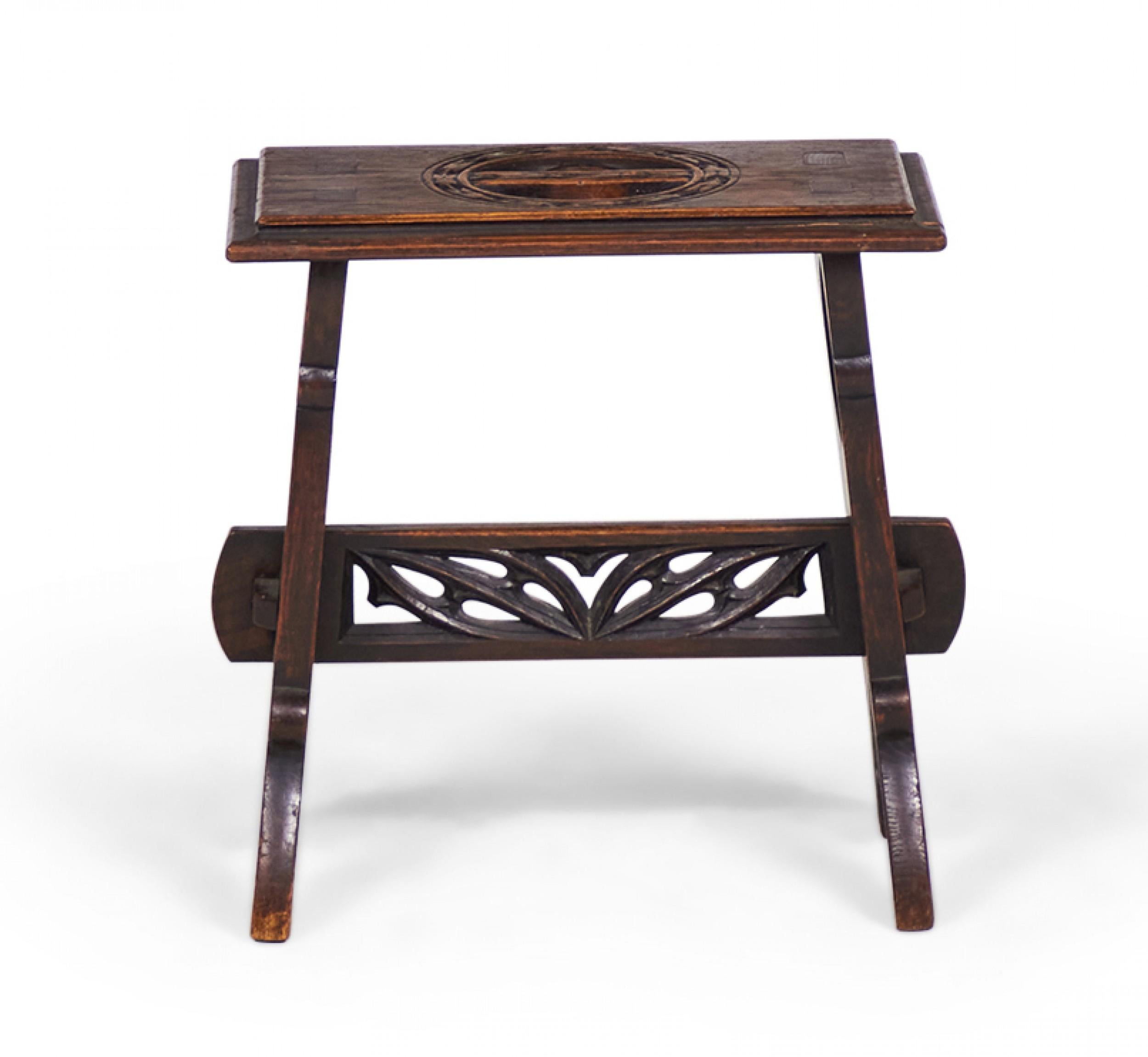 Pair of English Gothic-Style (19/20th Century) carved mahogany benches with a four-four point clover design on the sides and tops and a stretcher base. (PRICED AS PAIR).