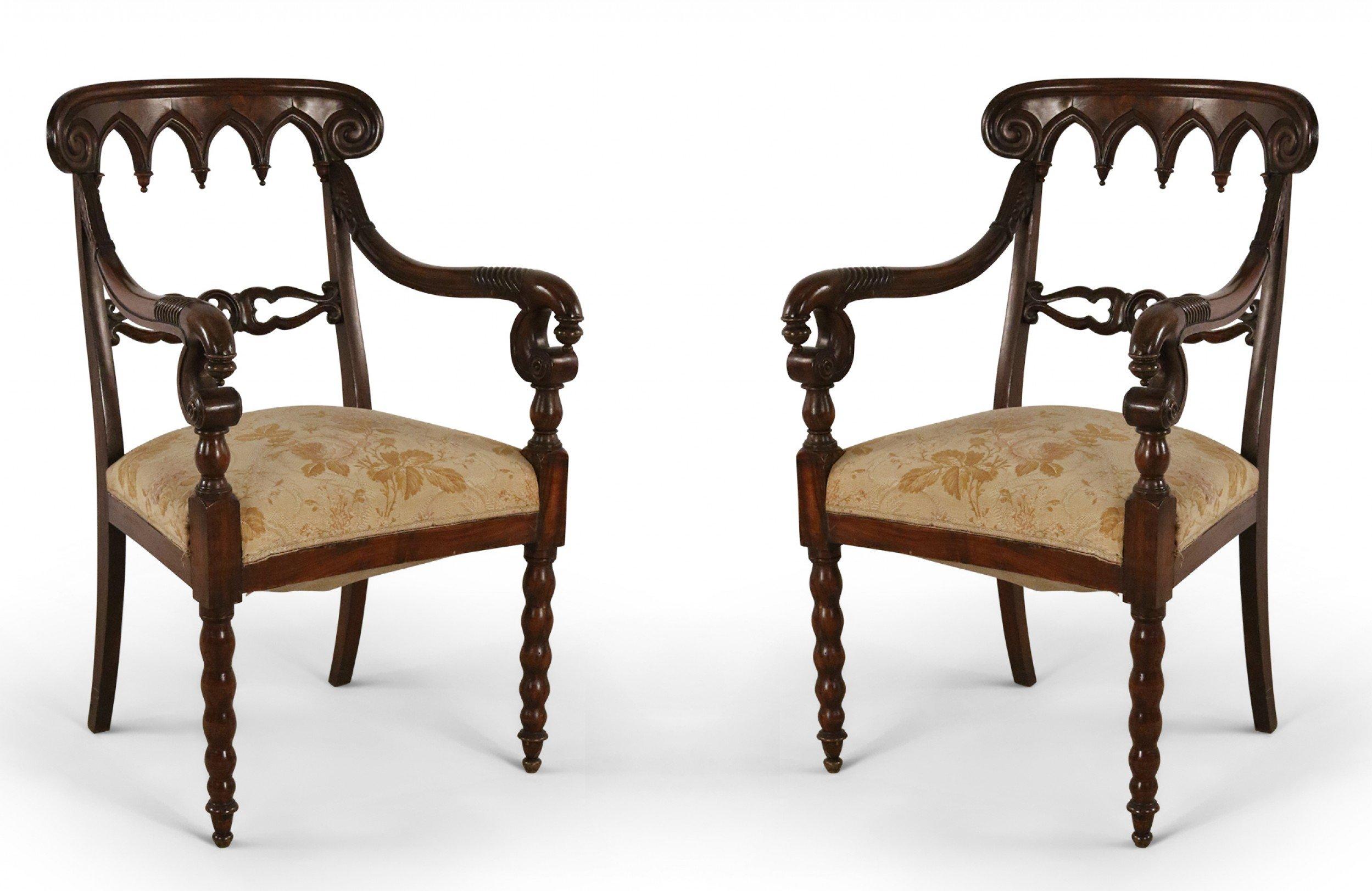 Pair of English Gothic-style (late 19th Century) mahogany armchairs having tapered spool form front legs with carved details and gold damask upholstered seats. (priced as pair).
  