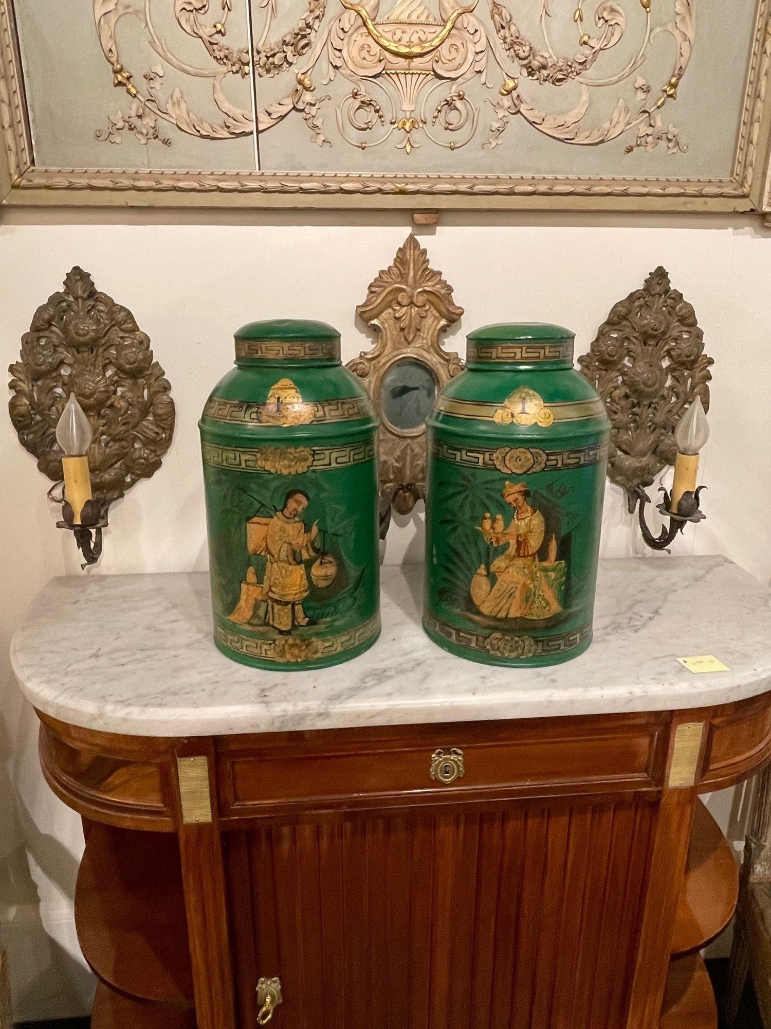 Pair of antique English green chinoserie painted tea cans. Circa 1890. A timeless and classic touch for a fine interior.