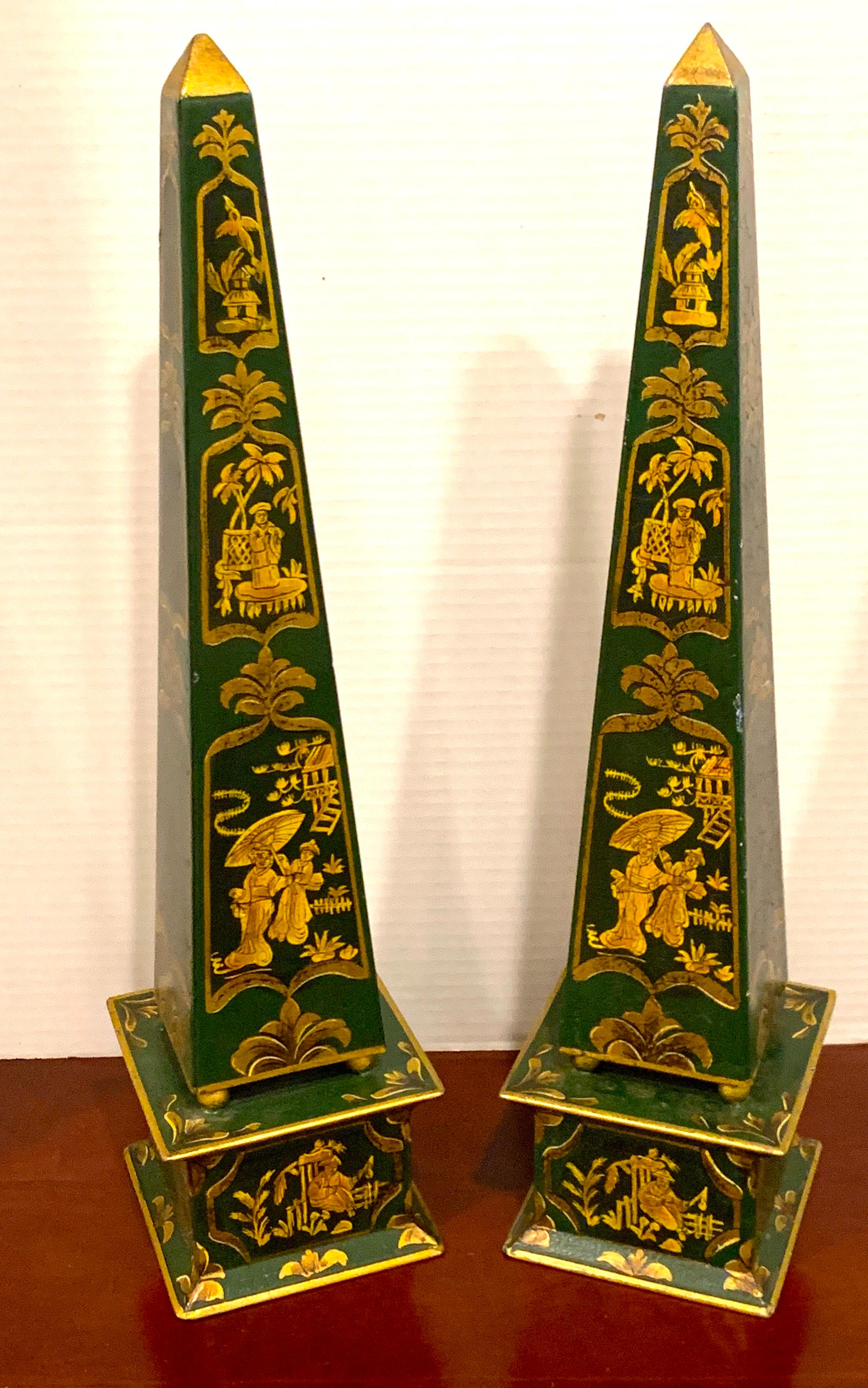 Pair of English green tole gilt chinoiserie obelisks, beautifully decorated on all sides.