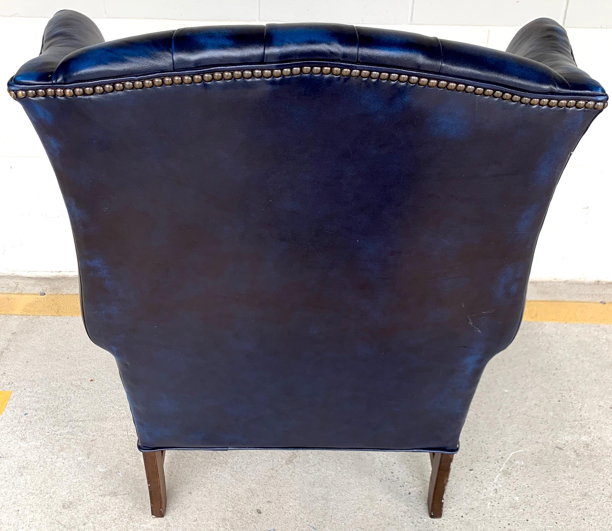 Pair of English Hollywood Regency blue leather Wing Back Chesterfield Chairs In Good Condition In West Palm Beach, FL