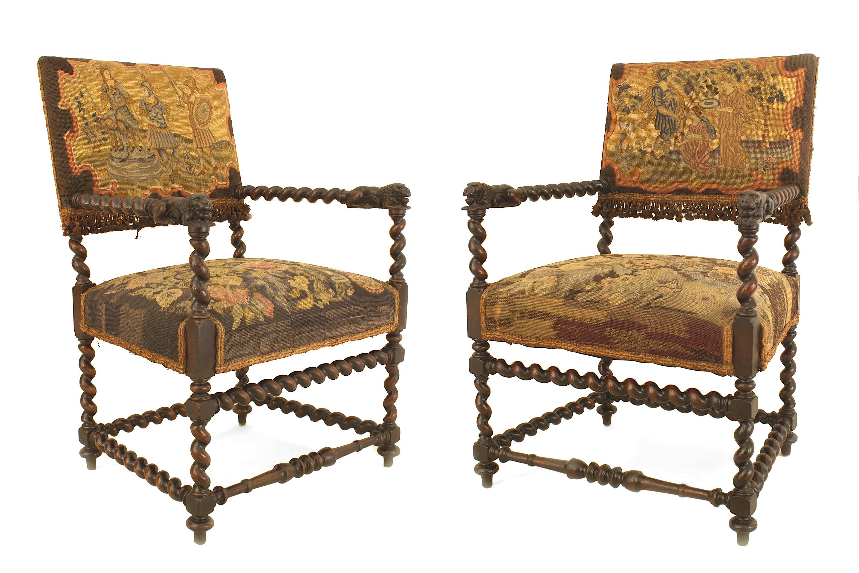 Pair of English Jacobean style (19th century) swirl design walnut armchairs with lion carved arms with a tapestry upholstered seat and back with a box form stretcher.