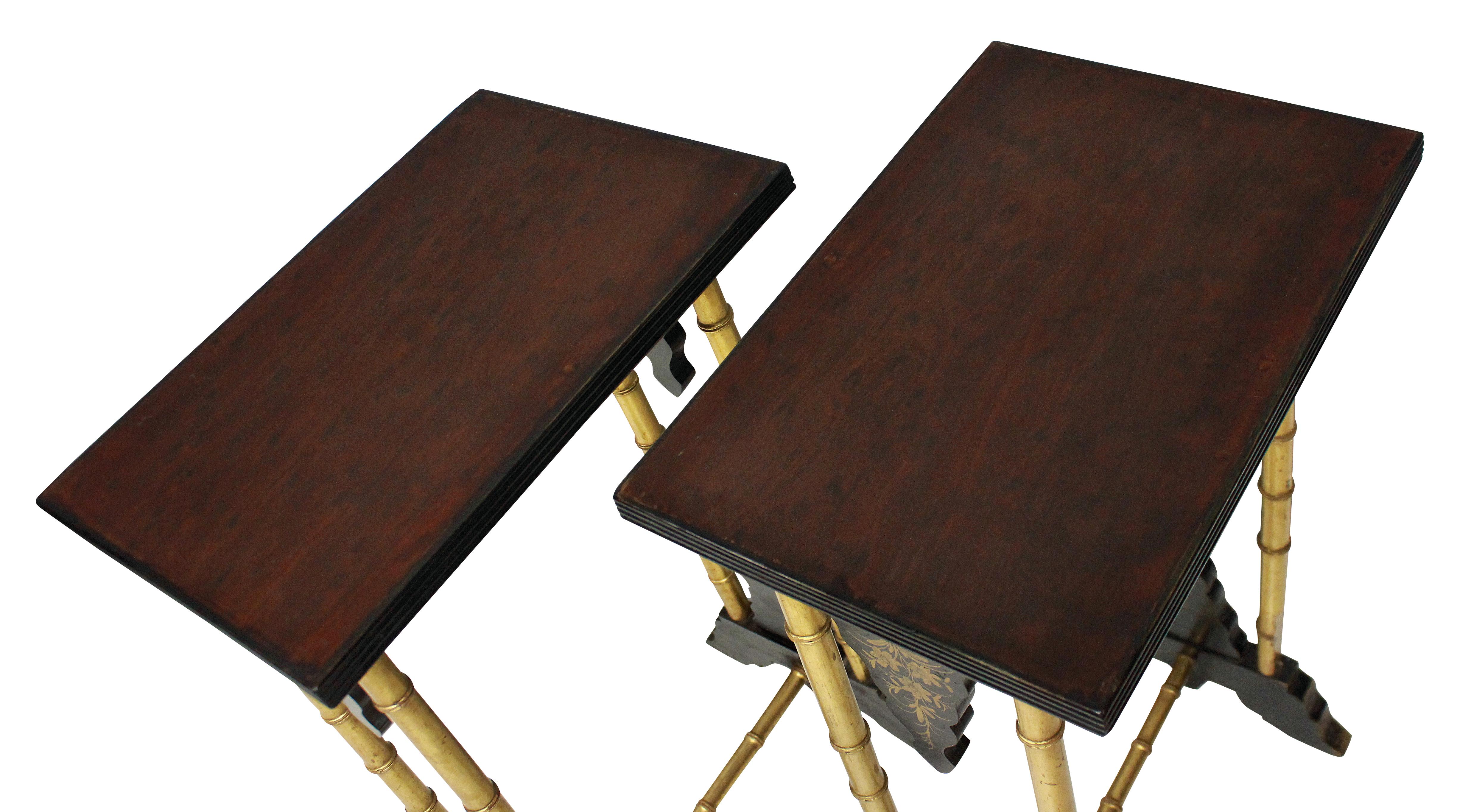 A pair of English Japanned wine tables, with faux bamboo giltwood legs and black Japan work detailing with mahogany tops.