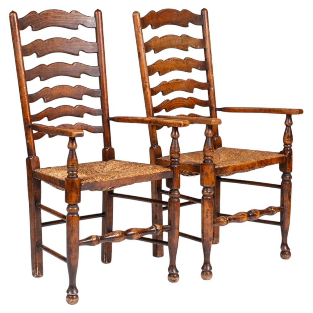 Pair of English Lancashire Ladderback Oak Armchairs with Original Rush Seats