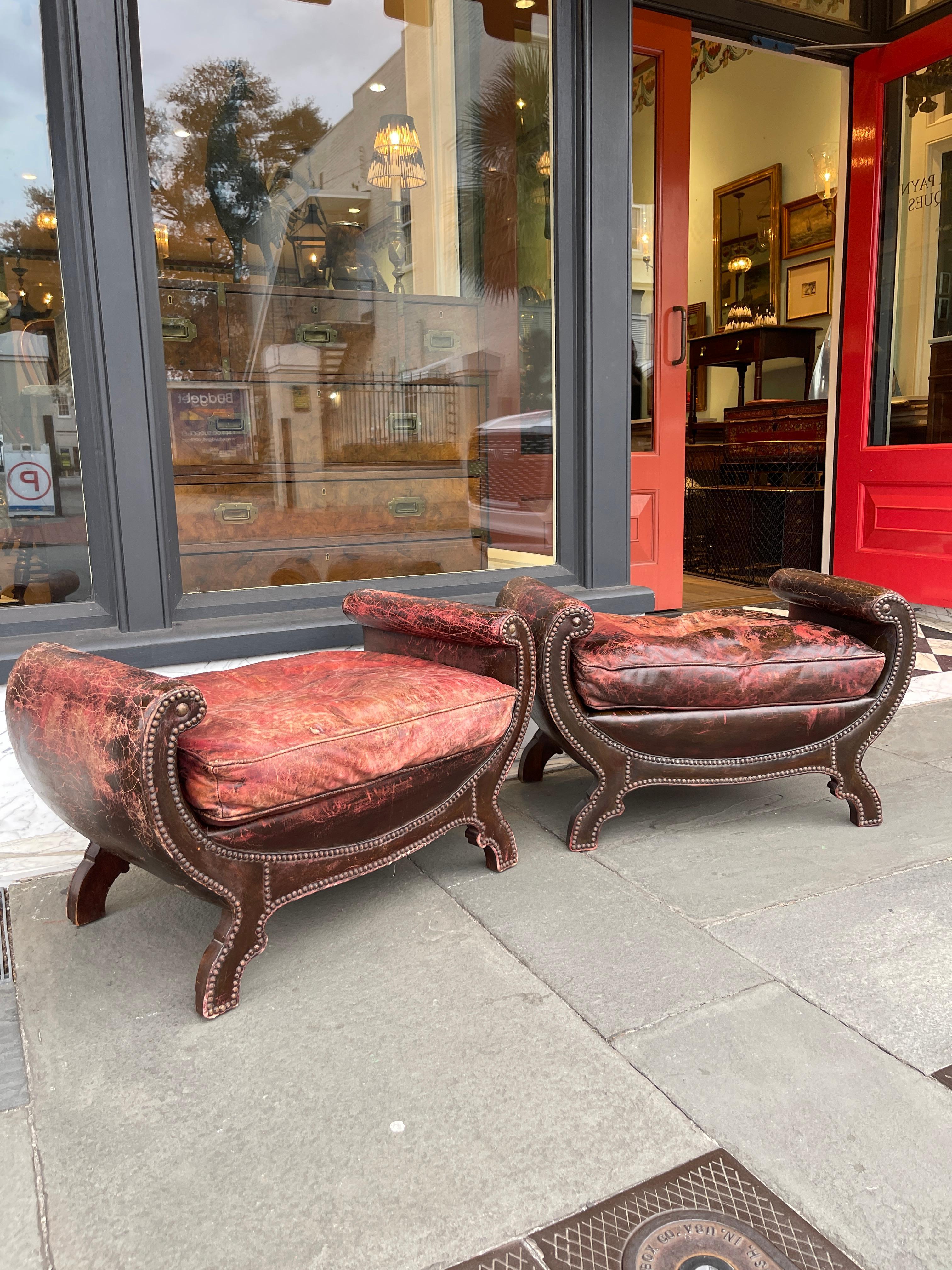 Pair of English leather window benches. Leather is very worn but in good condition. The color is faded between red and black. Please note leather condition in pictures 