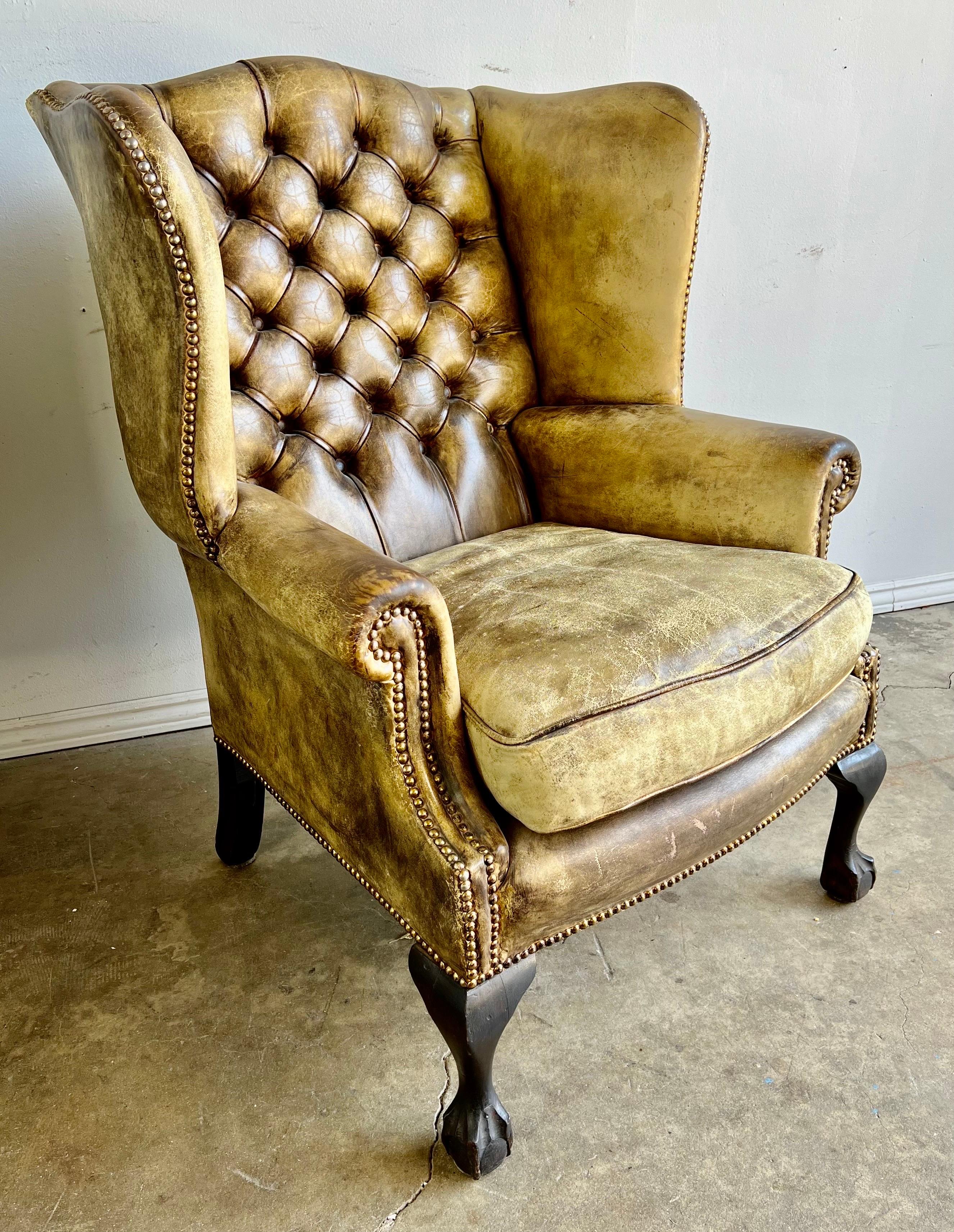 Pair of English Leather Tufted Wingback Armchairs C. 1900's In Distressed Condition In Los Angeles, CA