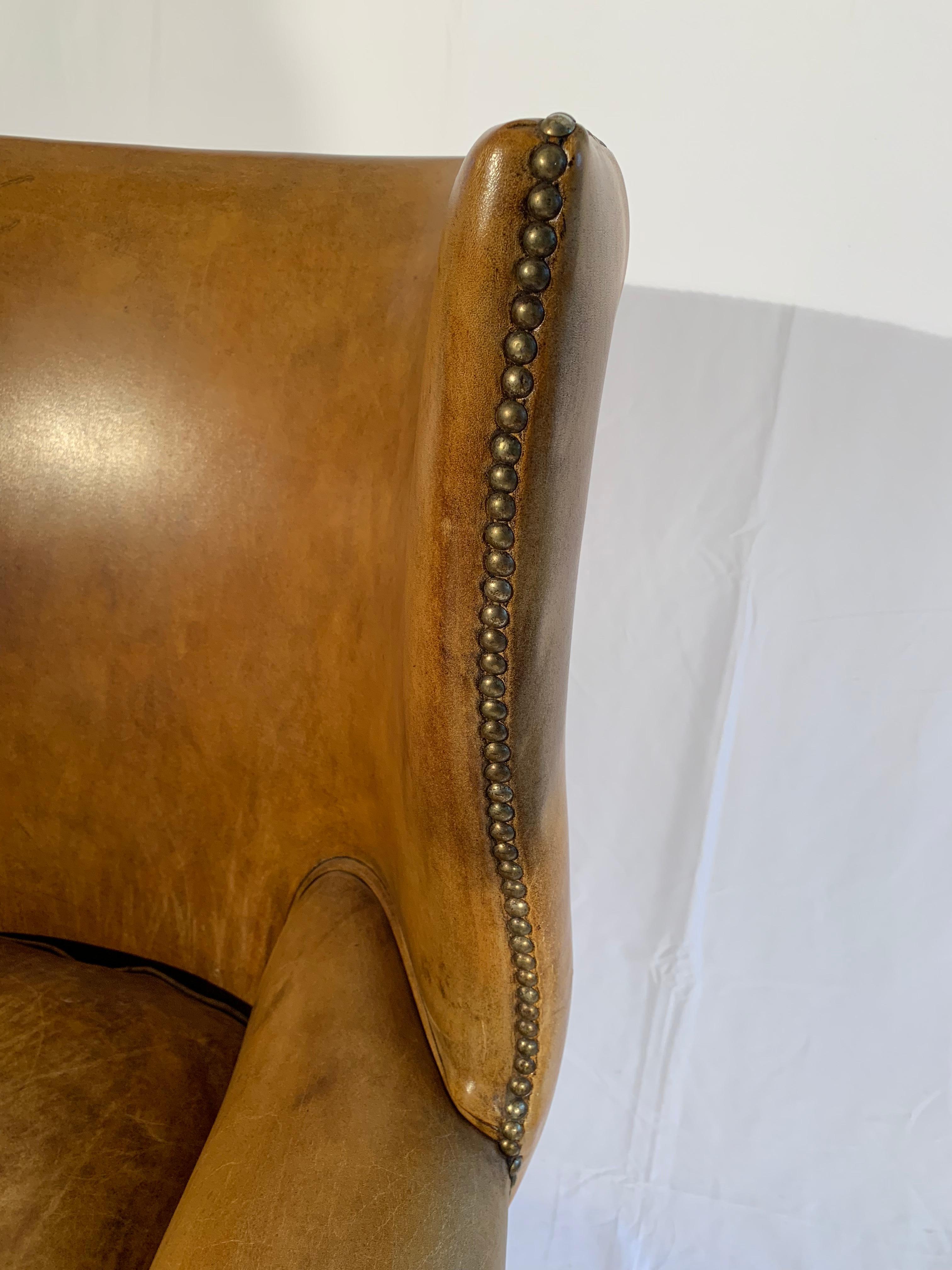 Pair of English Leather Wingback Chairs (Chesterfield)