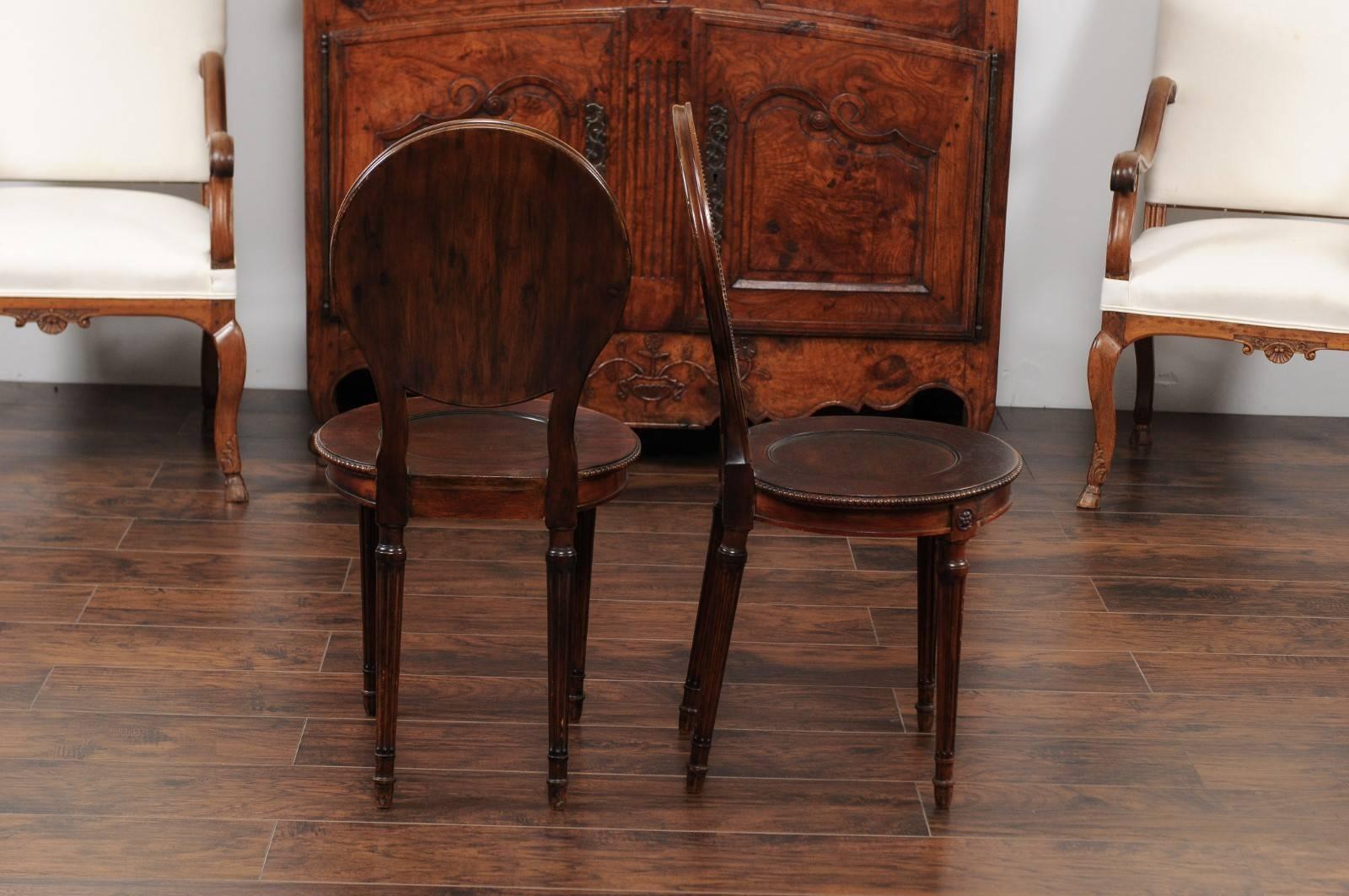 Pair of English Mahogany Hall Chairs, circa 1860 with Carved Round Backs 6