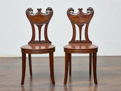 Pair of English Mahogany Hall Chairs with Carved Eagle Heads, 19th Century