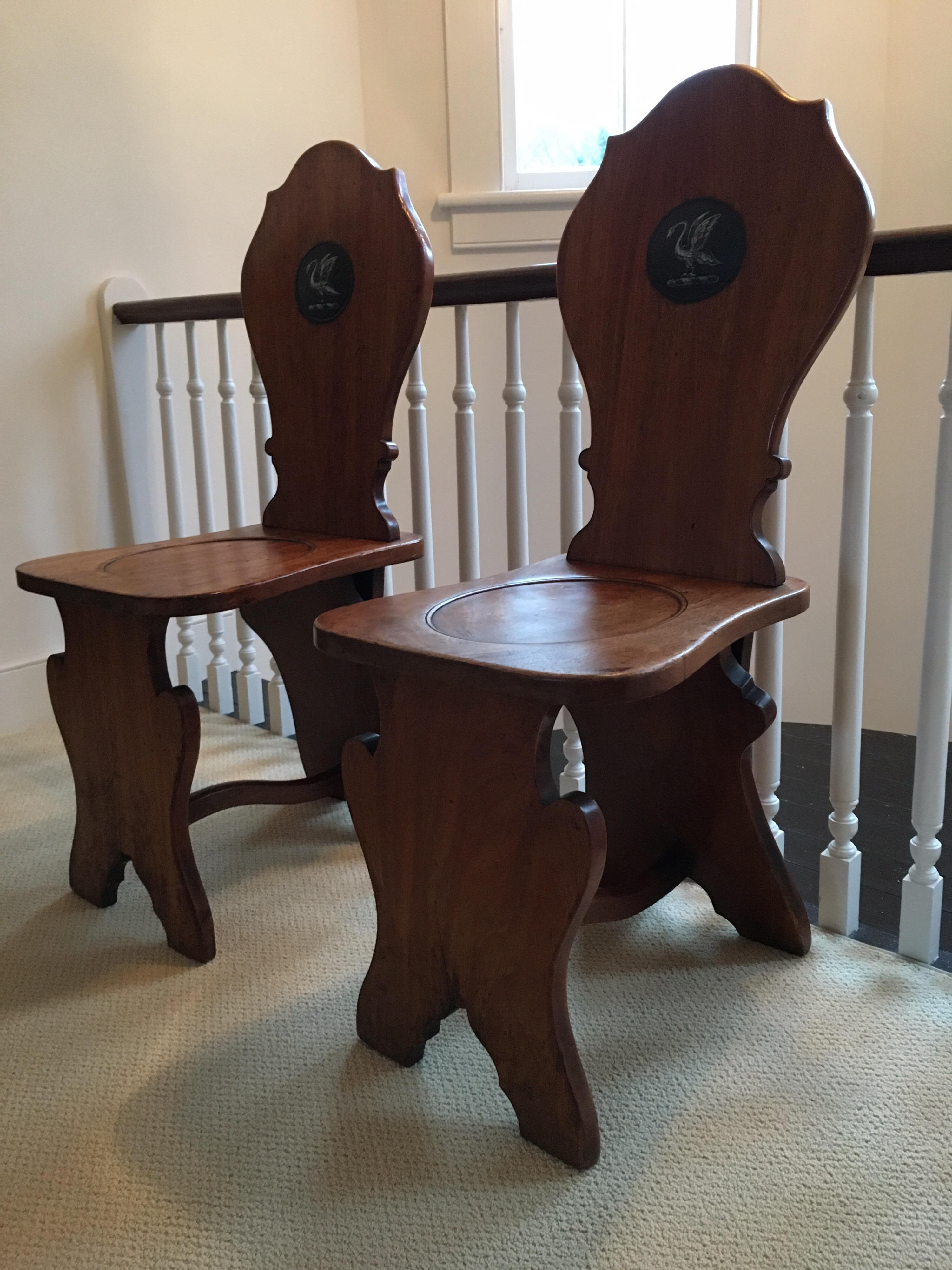 19th Century Pair of English Mahogany Hall Chairs with Heraldic Swan Motifs