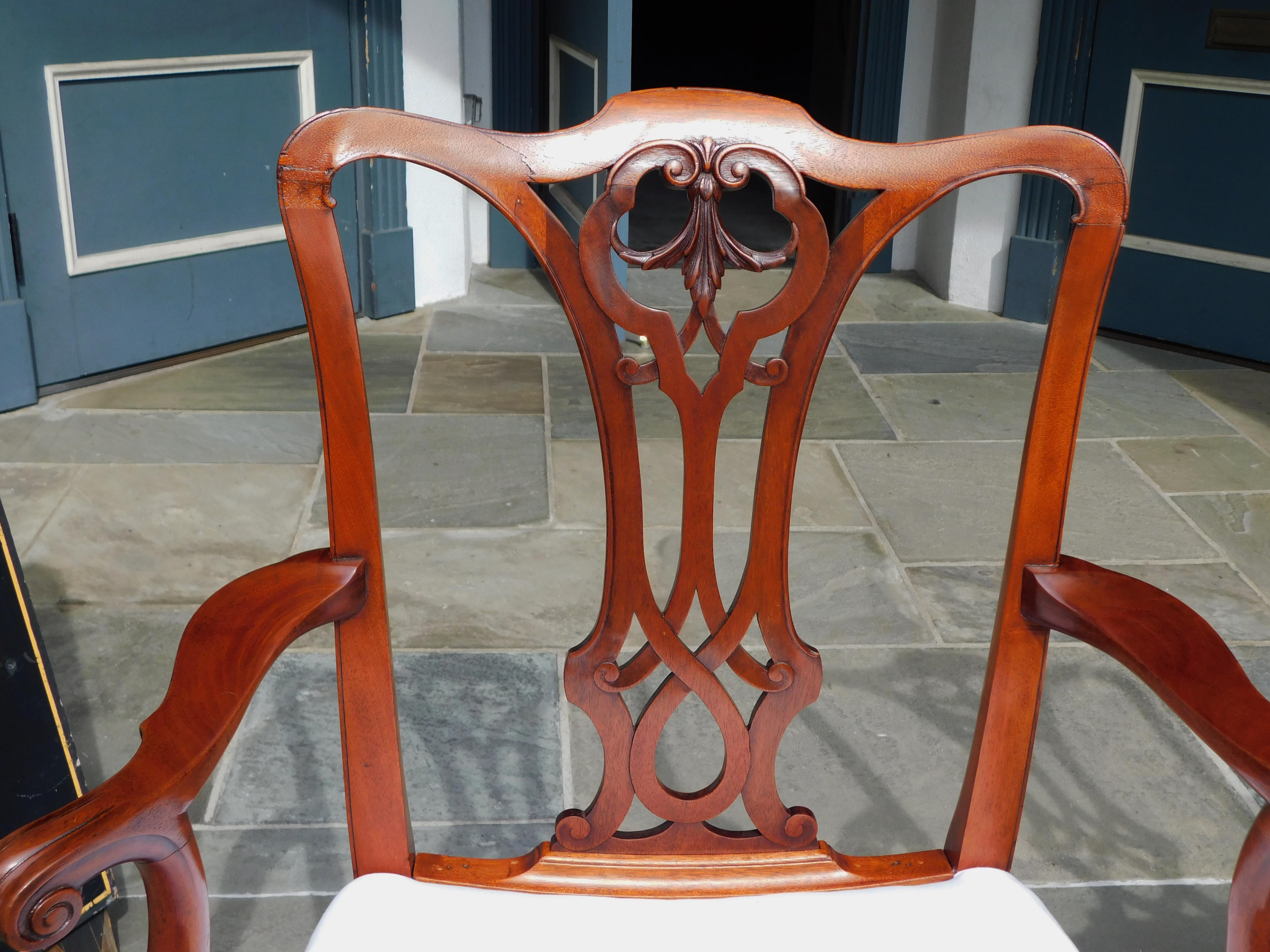 Muslin Pair of English Mahogany Serpentine Crest Arm Chairs with Saddle Seats, C. 1820 For Sale