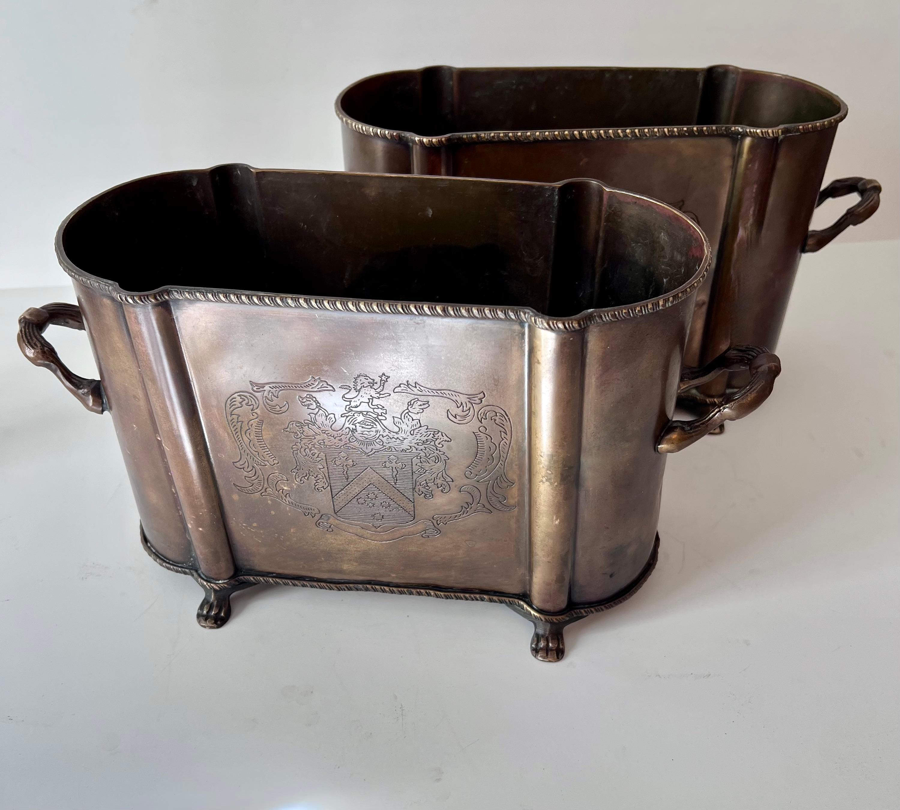 Pair of English Metal Cachepots or Jardinieres with Claw Feet and a Crest from 5