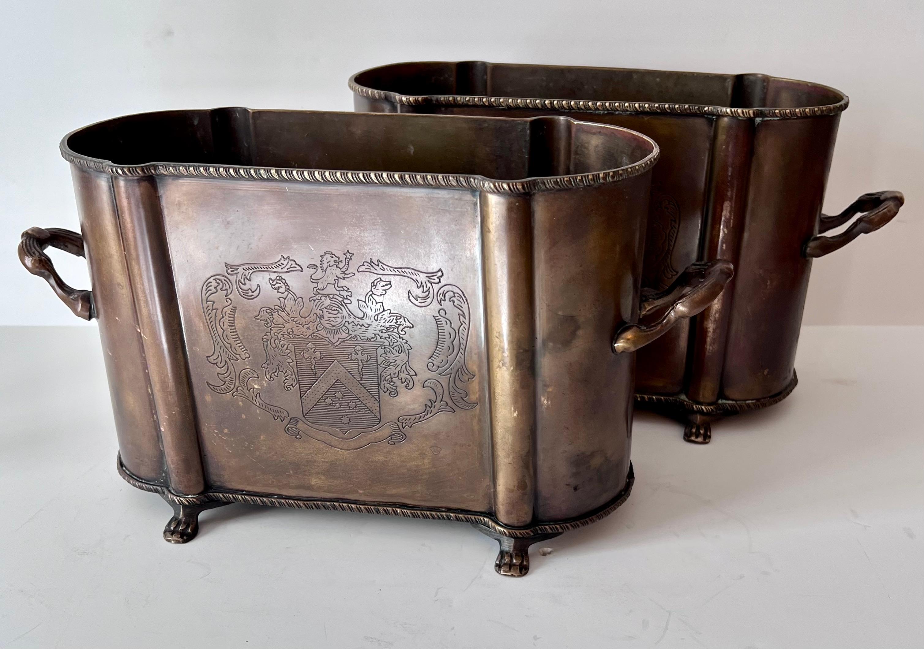 Pair of English Metal Cachepots or Jardinieres with Claw Feet and a Crest from 13