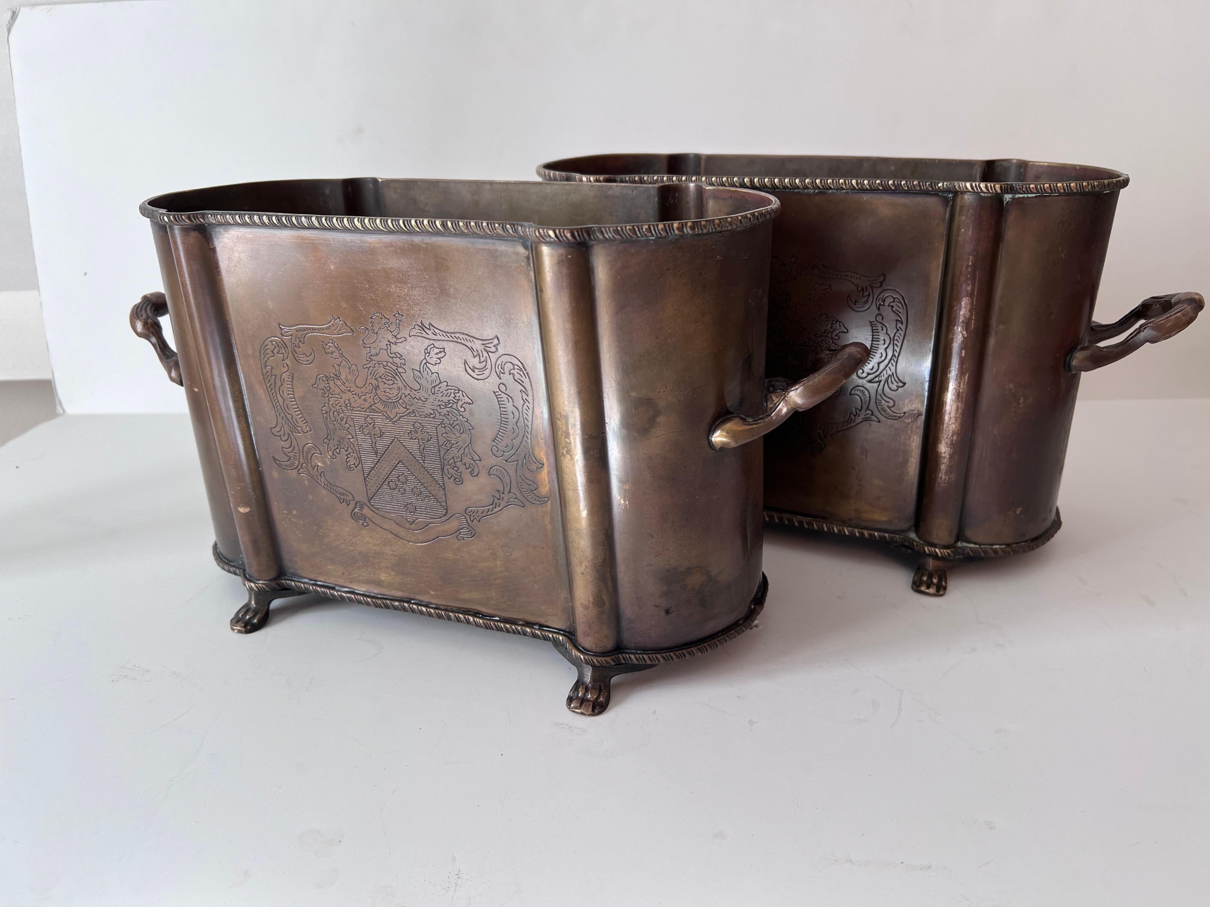 20th Century Pair of English Metal Cachepots or Jardinieres with Claw Feet and a Crest from
