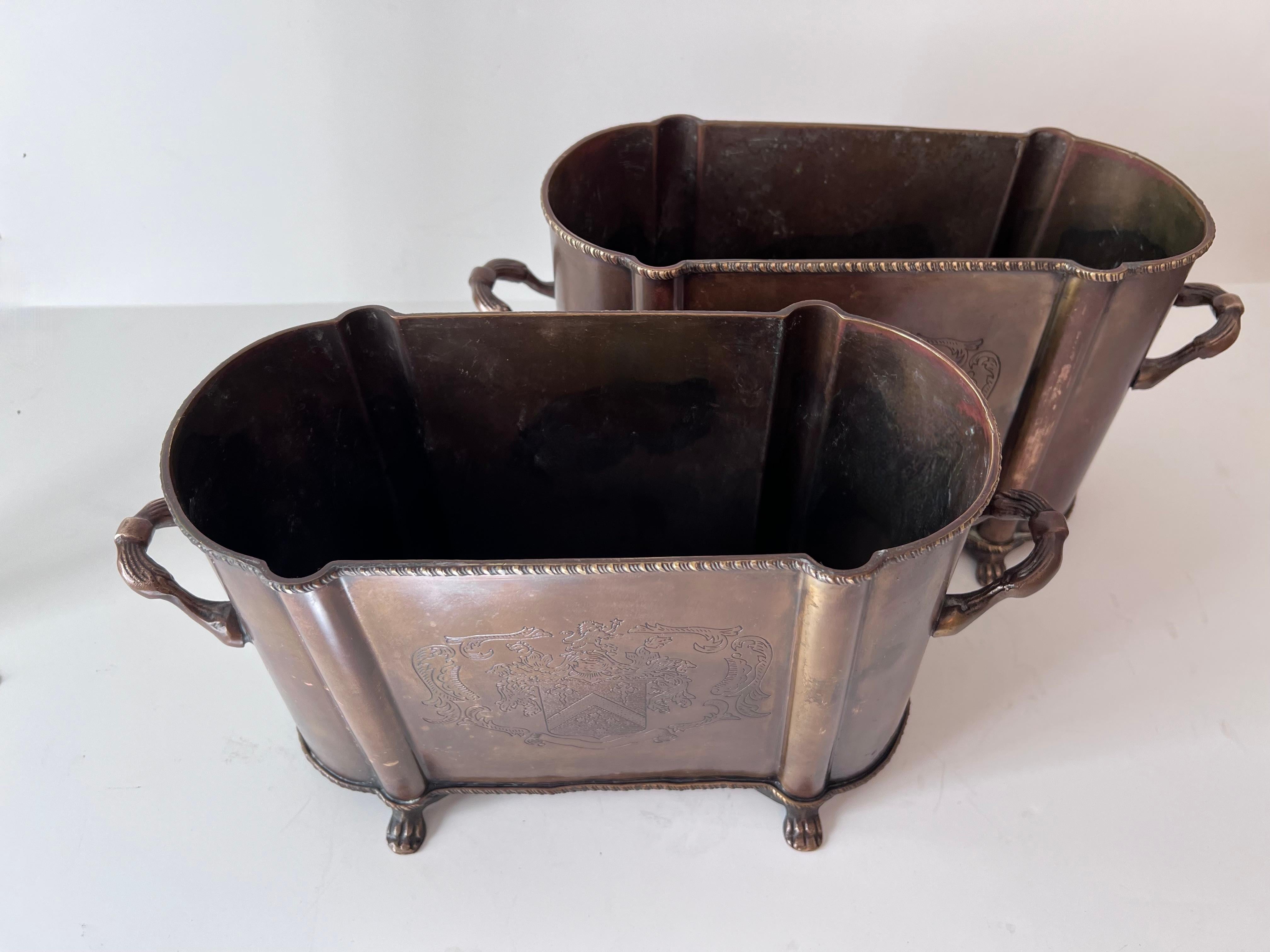 Pair of English Metal Cachepots or Jardinieres with Claw Feet and a Crest from 4