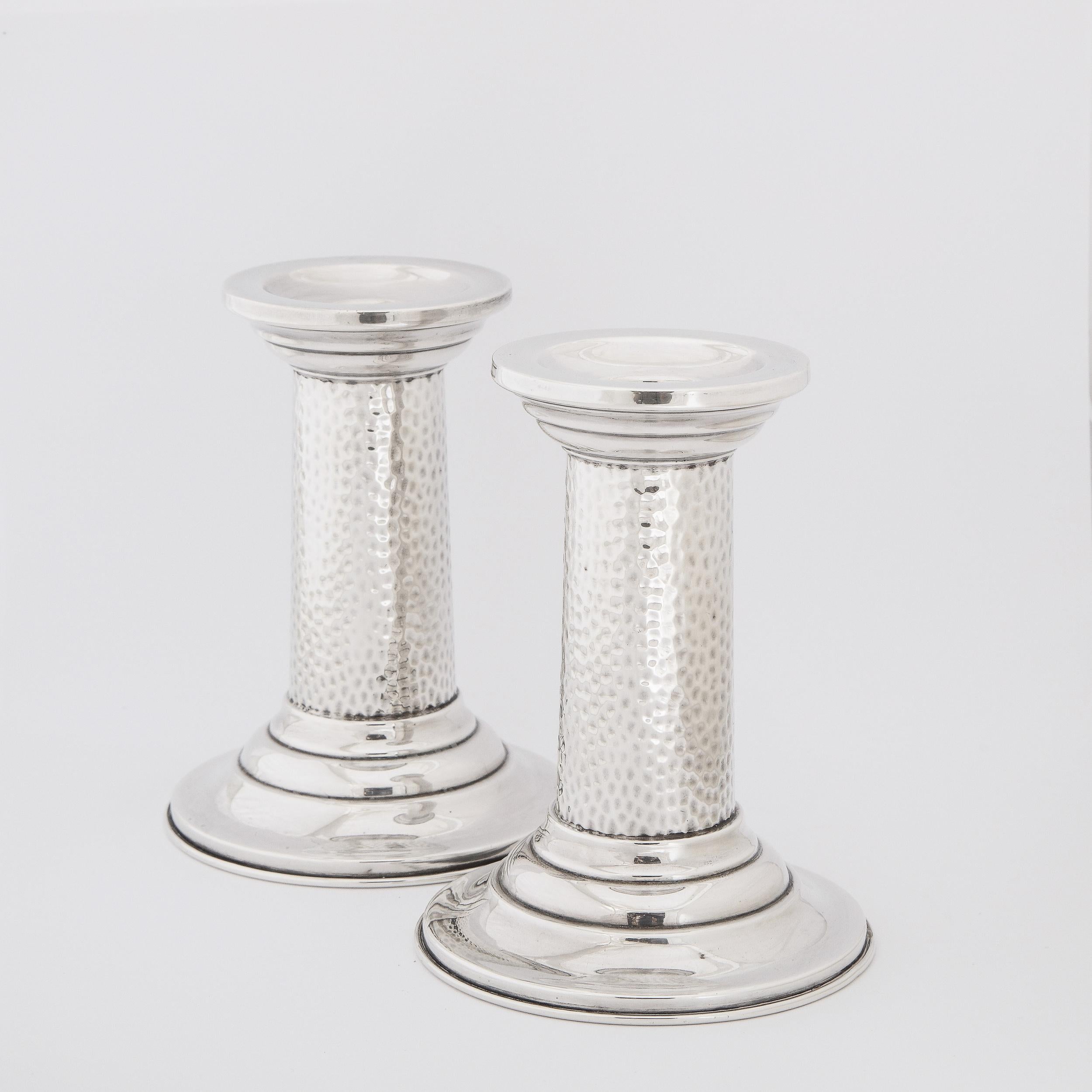 Pair of English Mid-Century Modern Sterling Hand Hammered Candlesticks In Good Condition In New York, NY