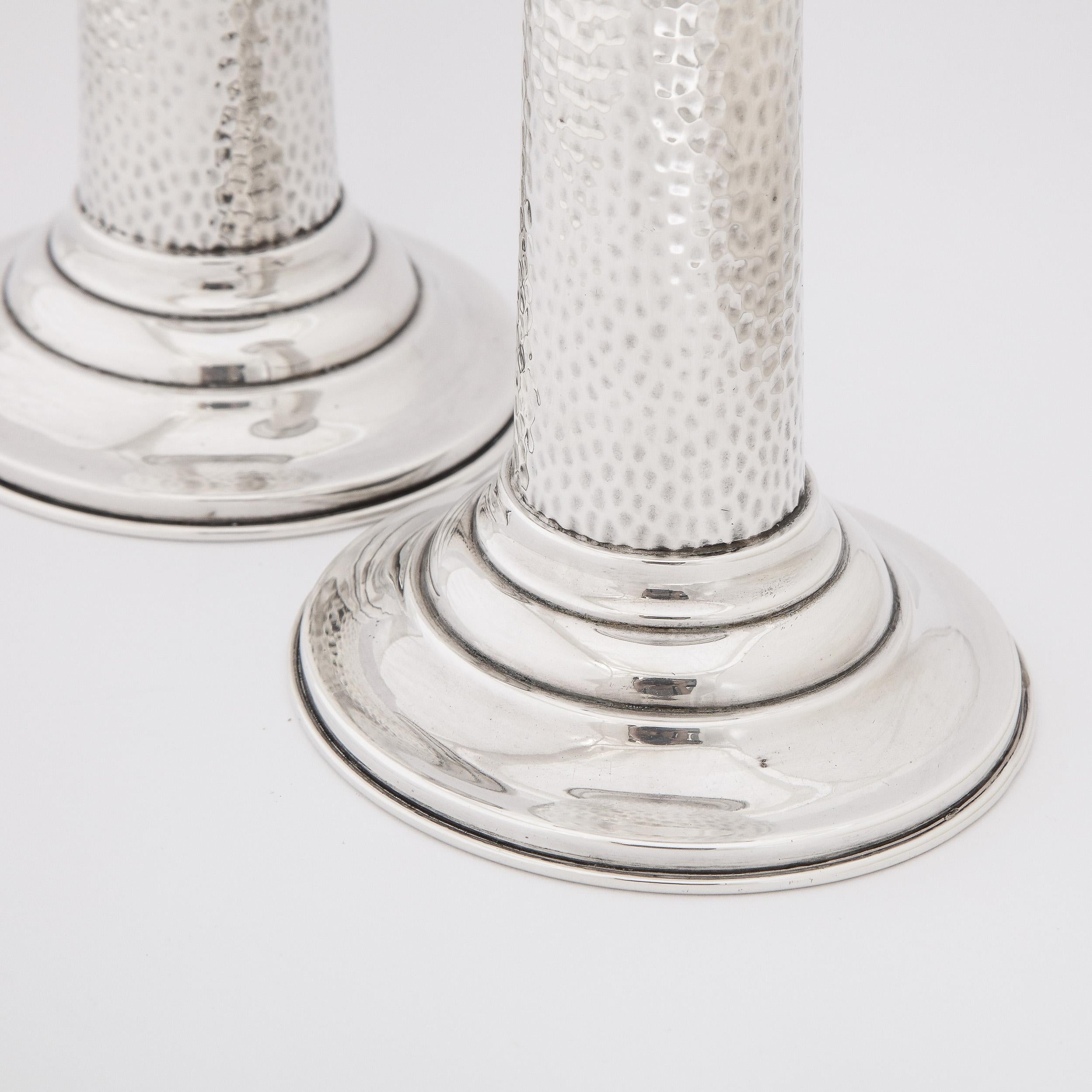 Mid-20th Century Pair of English Mid-Century Modern Sterling Hand Hammered Candlesticks