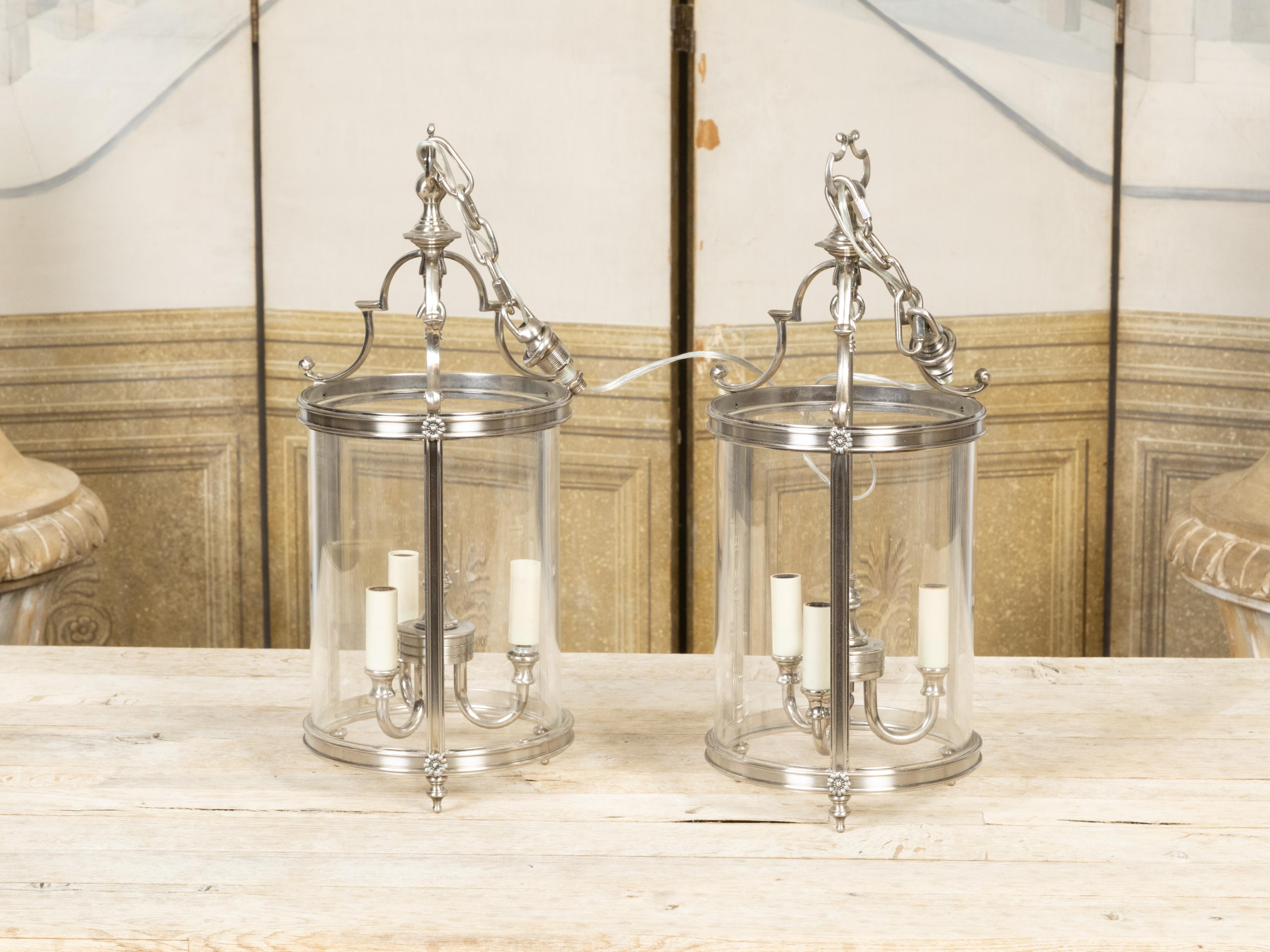 Mid-Century Modern Pair of English Mid-Century Three-Light Nickel Finish Hall Lanterns with Glass For Sale