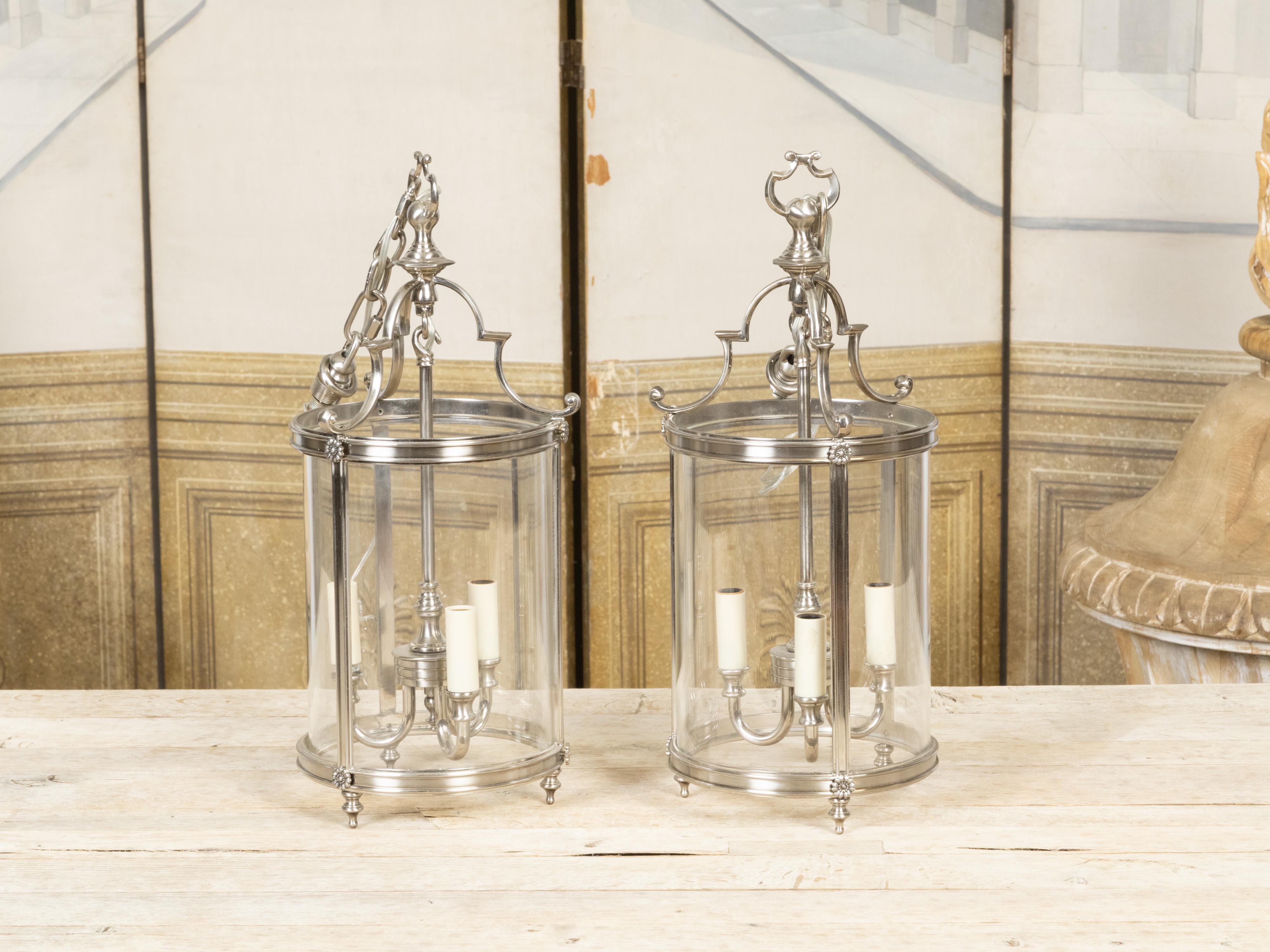 20th Century Pair of English Mid-Century Three-Light Nickel Finish Hall Lanterns with Glass For Sale