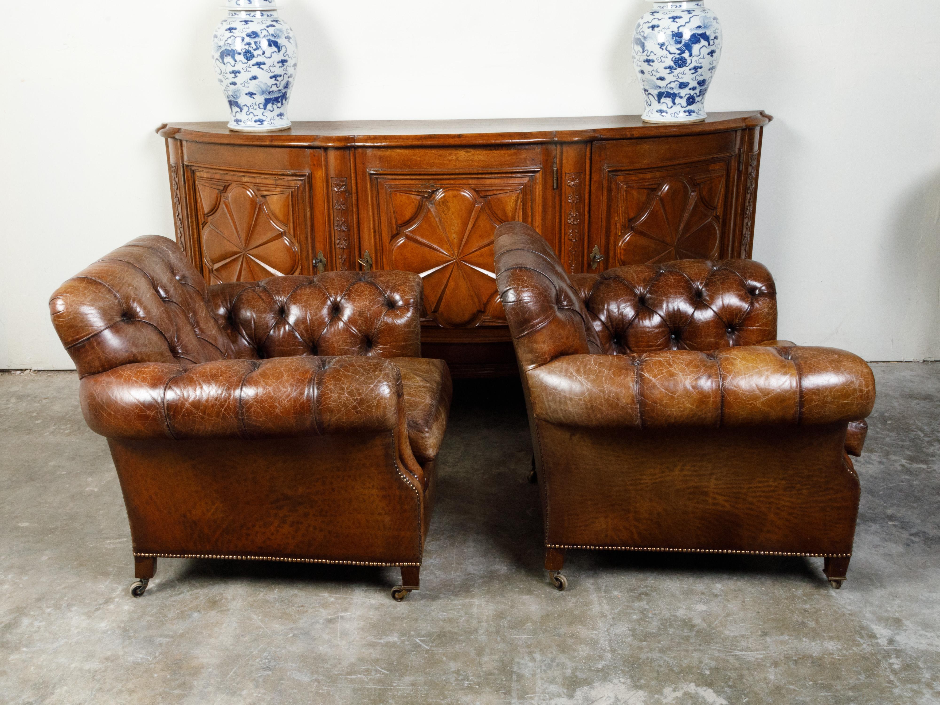 Pair of English Midcentury Tufted Leather Club Chairs with Nailheads and Casters 5