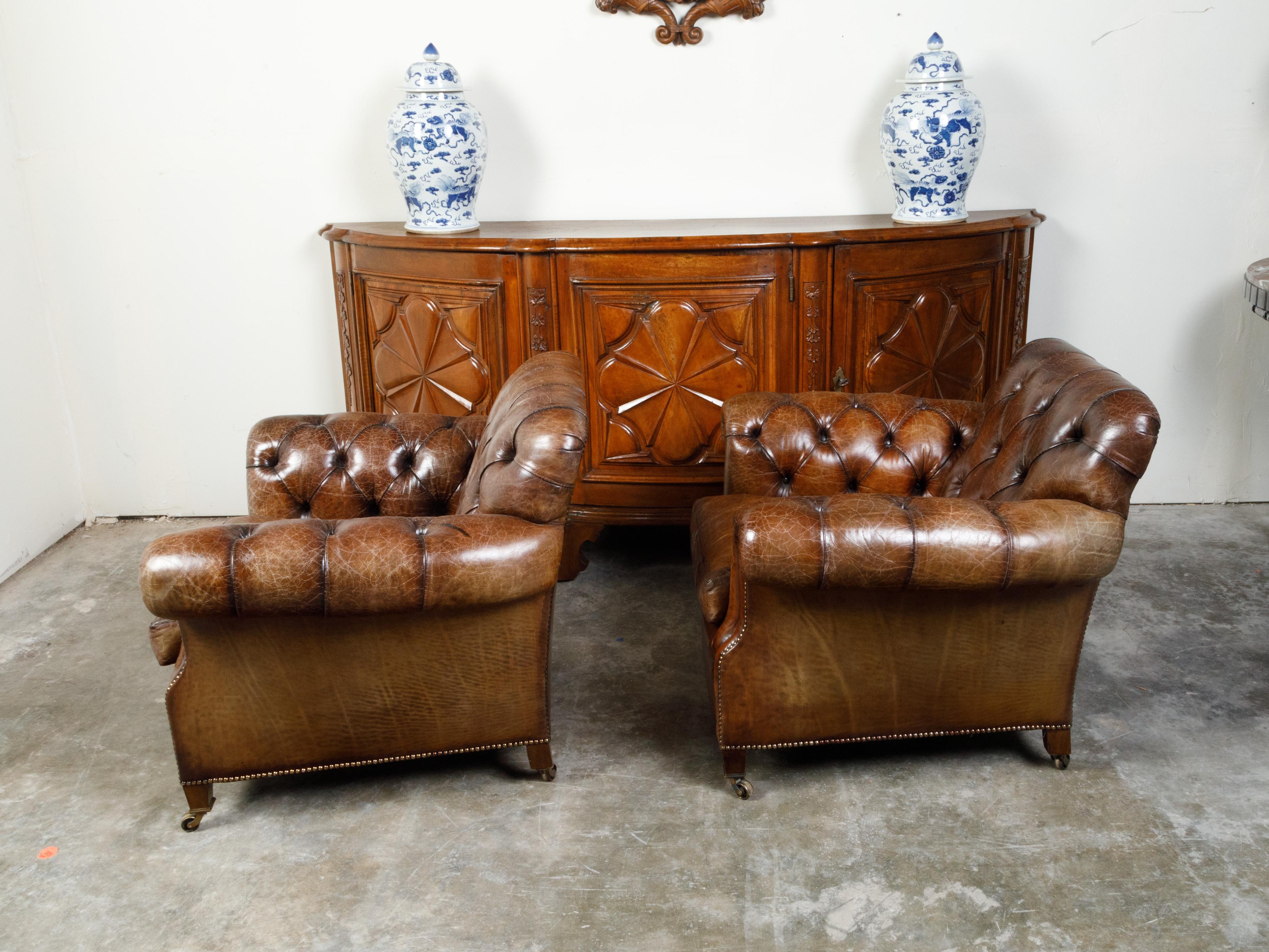 Pair of English Midcentury Tufted Leather Club Chairs with Nailheads and Casters 3