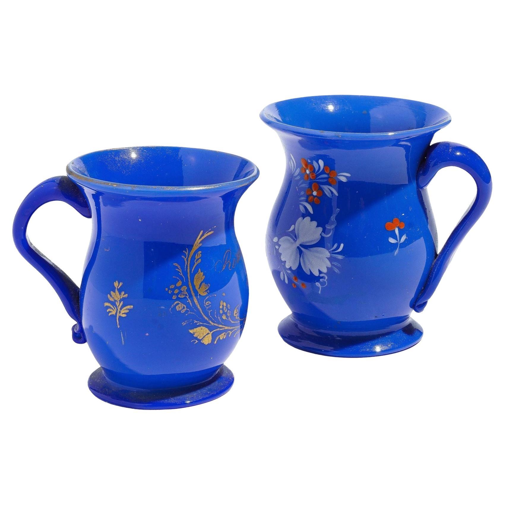 Pair of English miniature blue opaline blown glass mugs, c. 1830 For Sale