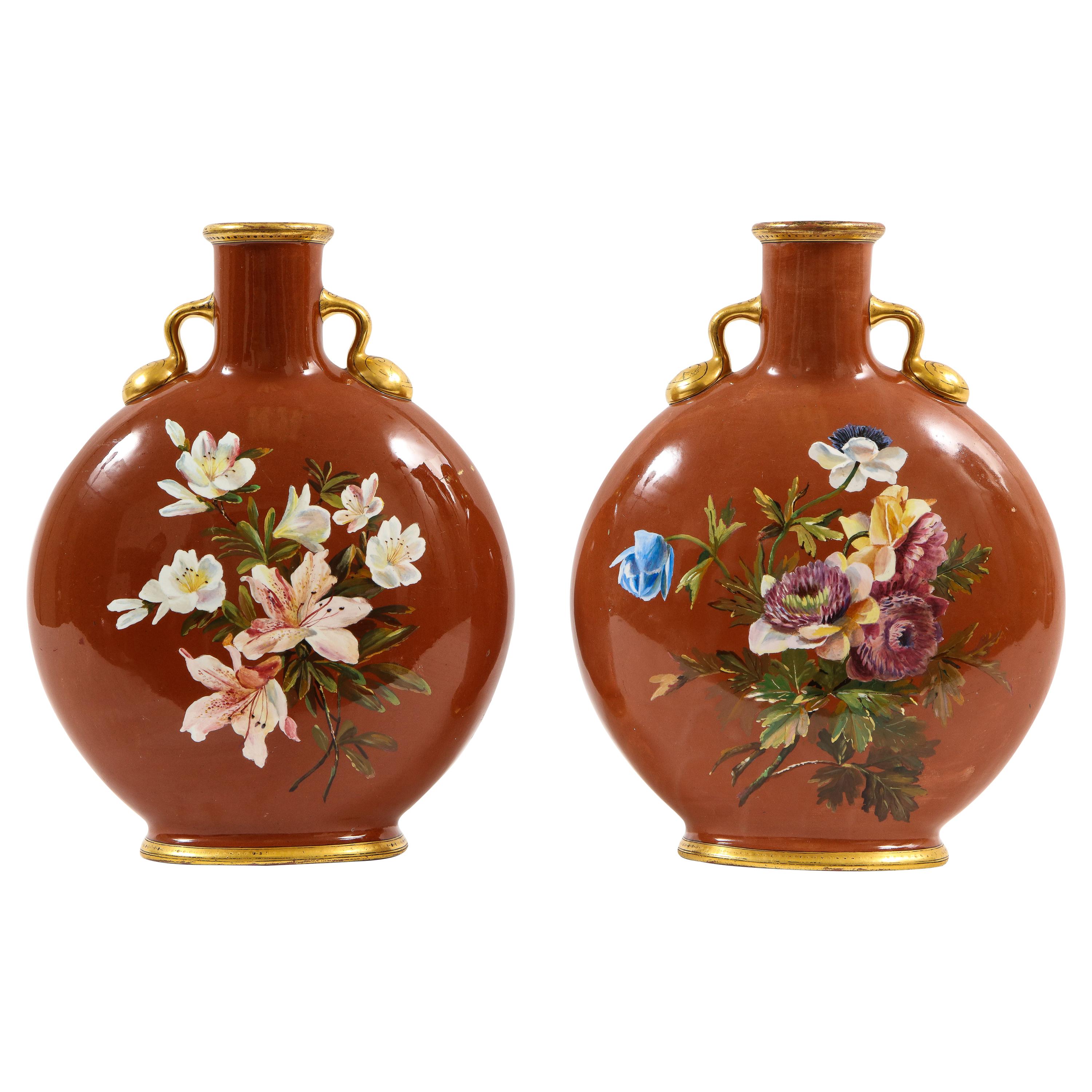 Pair of English Mintons Coral Ground Floral Motif Moon Flasks with Gilding