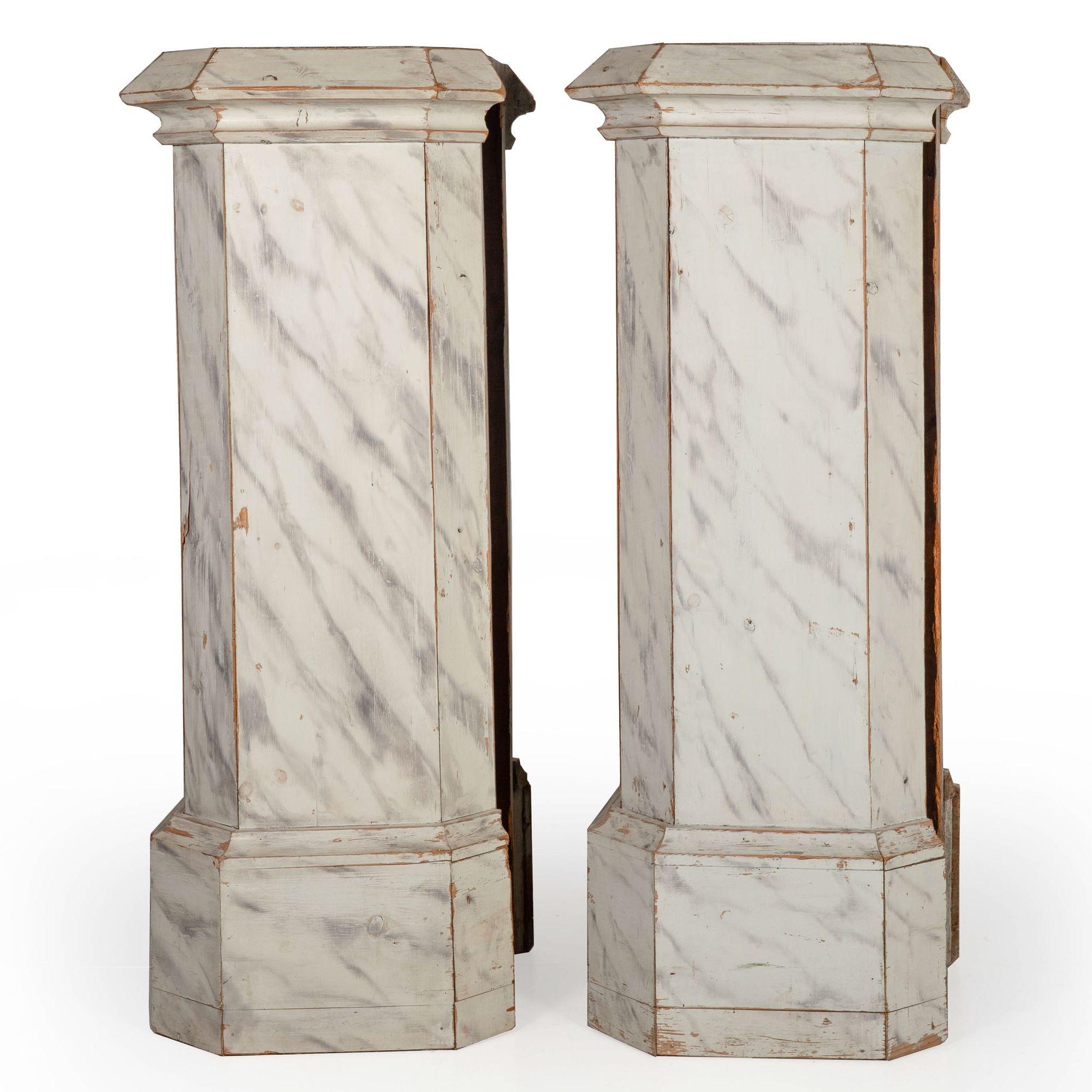 PAIR OF FAUX MARBLE PAINTED PINE COLUMNS IN ORIGINAL PAINT
Probably English, circa first quarter of the 20th century
Item # 403DWS18A

A great pair of substantial columns, they are executed in pine that has been painted in whites and grays to create